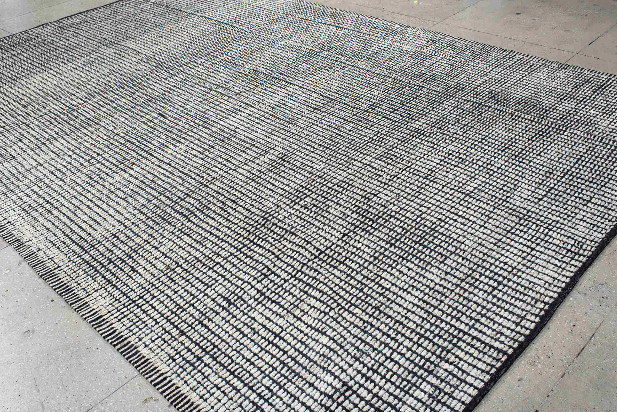 9' x 13' one-of-a-kind handmade vintage Tulu large size rug. Color palette: ivory, charcoal, gray, black