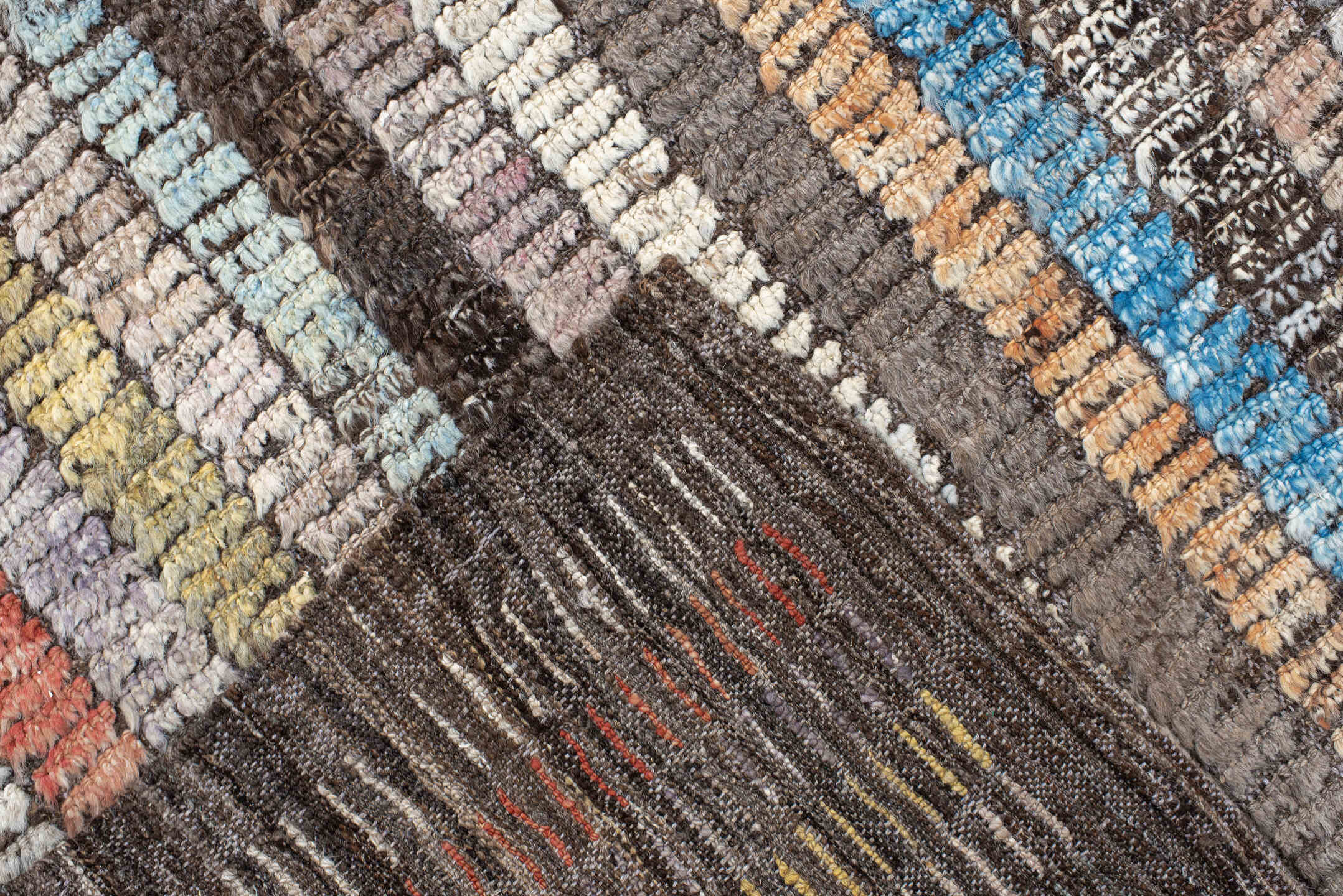 6' x 9' one-of-a-kind handmade vintage Tulu medium size rug. Color palette: brown, ivory, sky blue, coral, lavender, gold