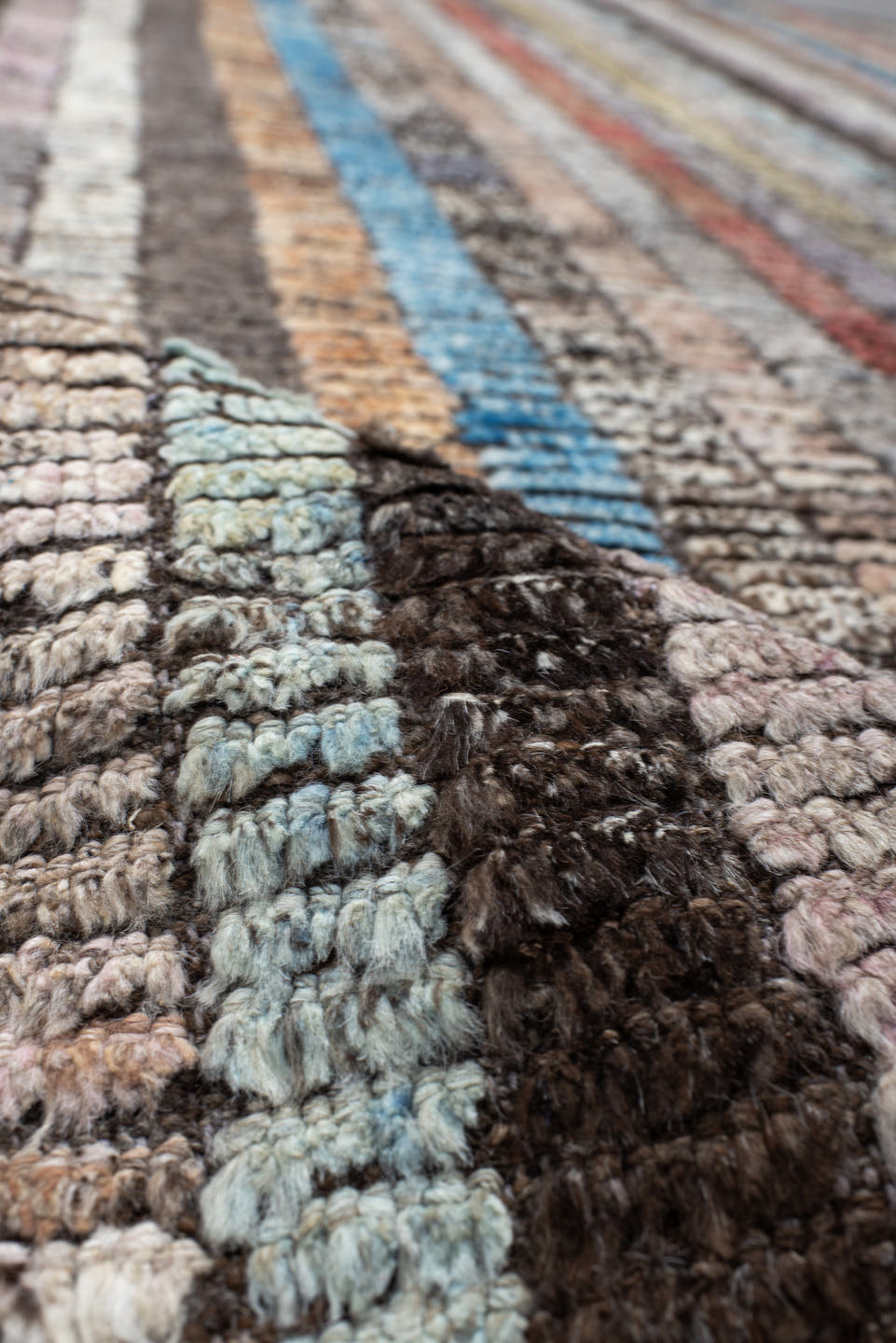 6' x 9' one-of-a-kind handmade vintage Tulu medium size rug. Color palette: brown, ivory, sky blue, coral, lavender, gold
