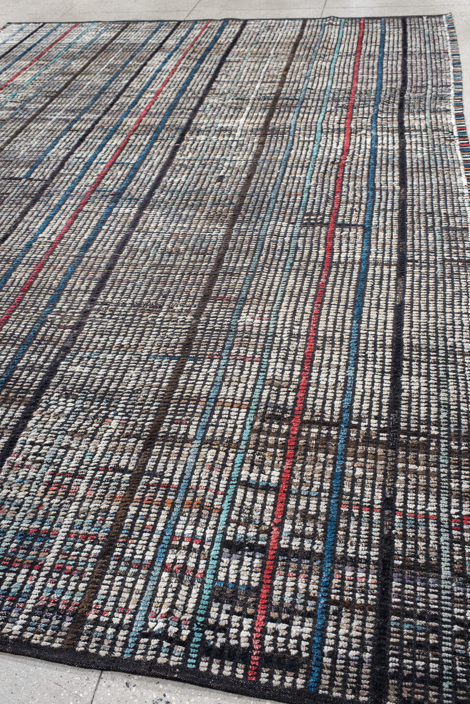 10' x 14' one-of-a-kind handmade vintage Tulu large size rug. Color palette: ivory, charcoal, slate, indigo, crimson, taupe