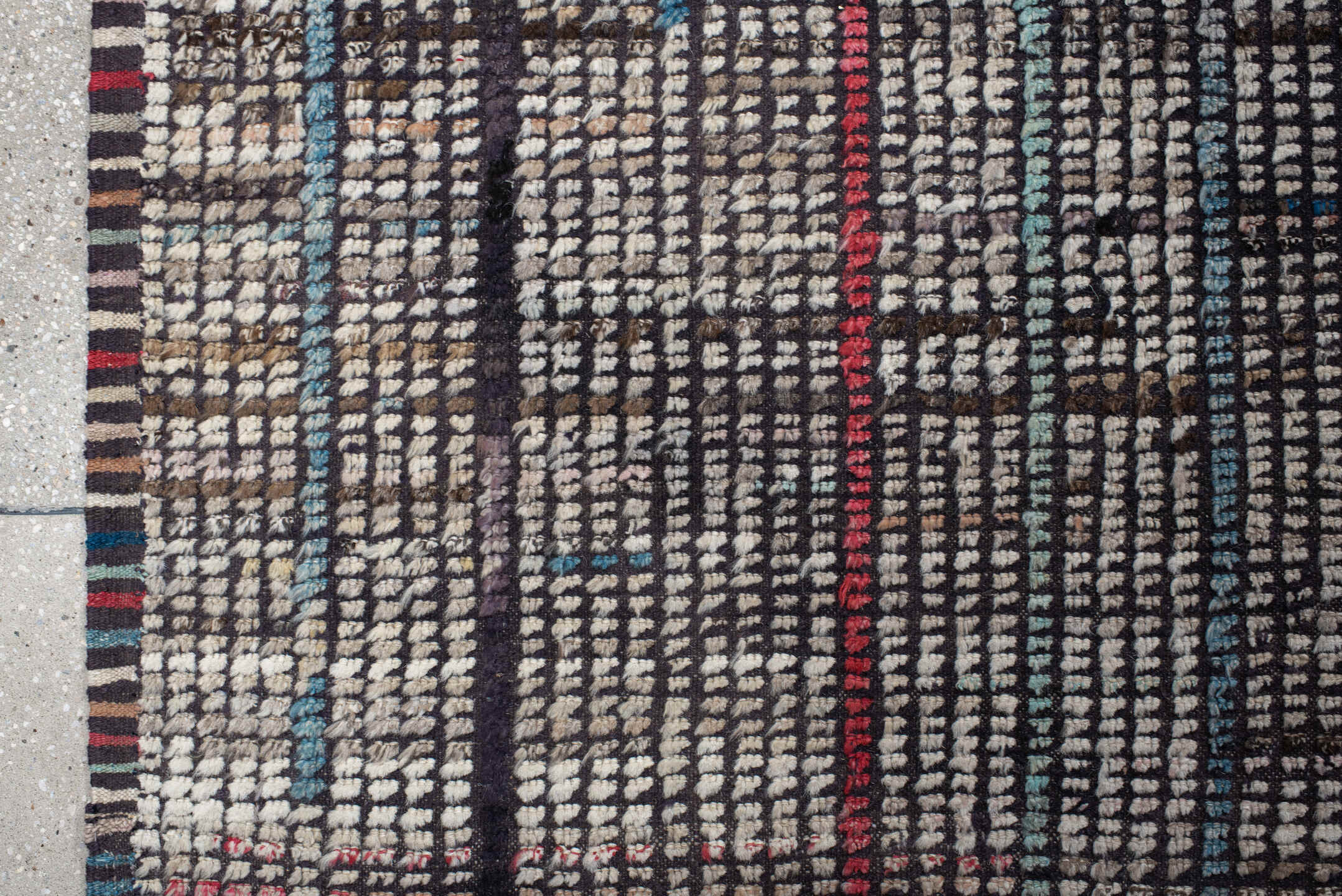 10' x 14' one-of-a-kind handmade vintage Tulu large size rug. Color palette: ivory, charcoal, slate, indigo, crimson, taupe