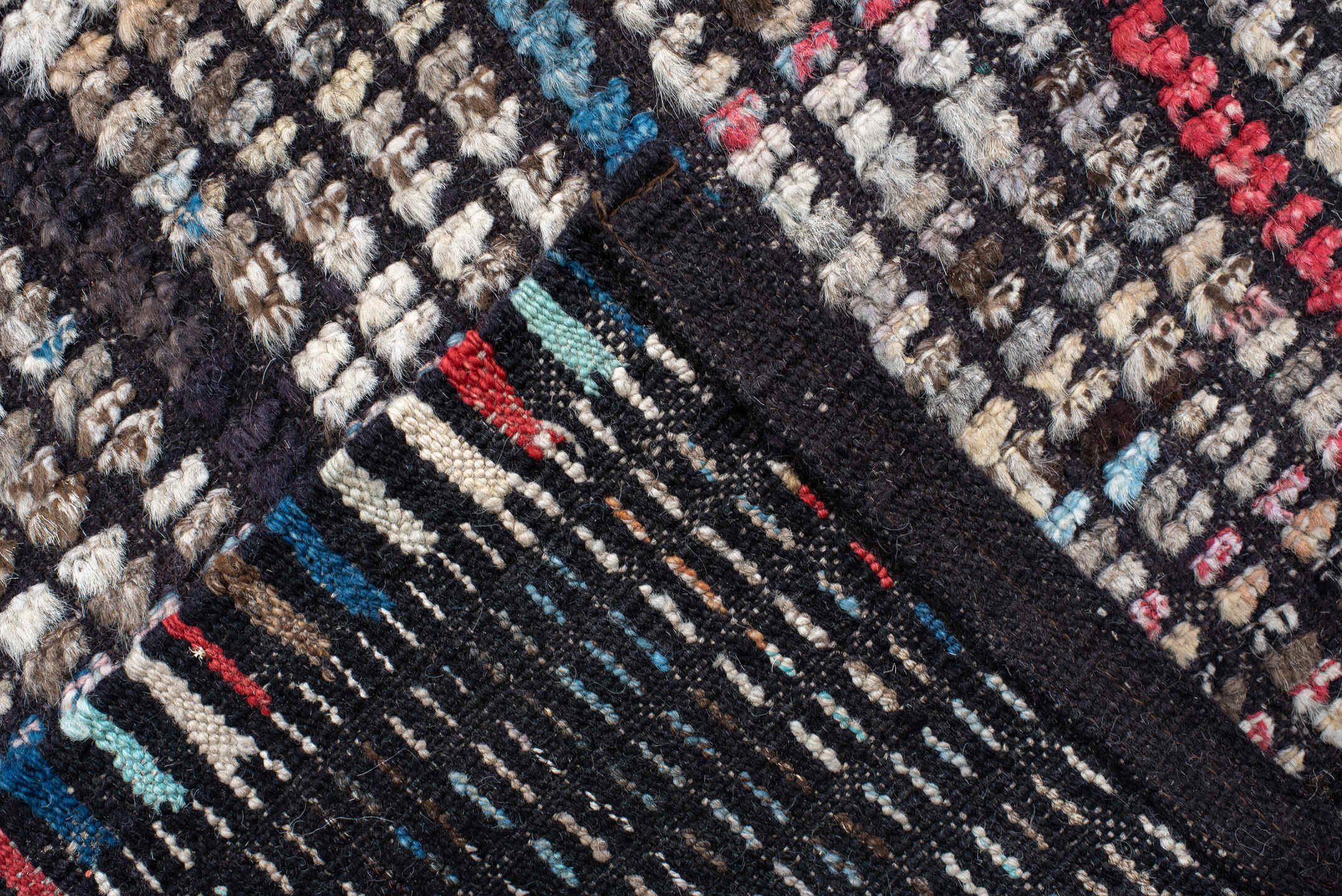 10' x 14' one-of-a-kind handmade vintage Tulu large size rug. Color palette: ivory, charcoal, slate, indigo, crimson, taupe