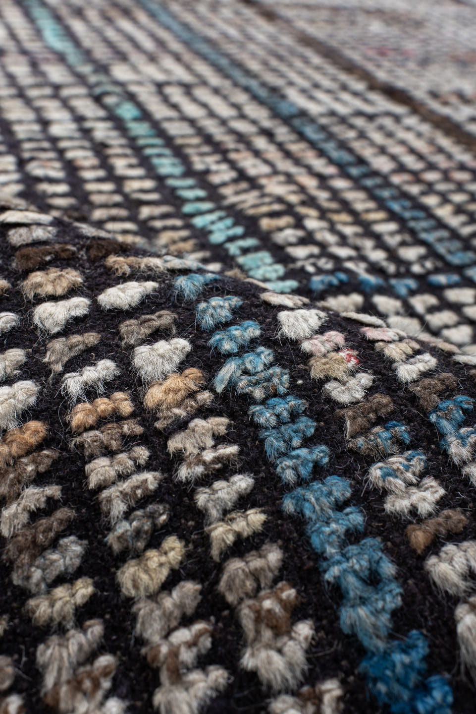 10' x 14' one-of-a-kind handmade vintage Tulu large size rug. Color palette: ivory, charcoal, slate, indigo, crimson, taupe