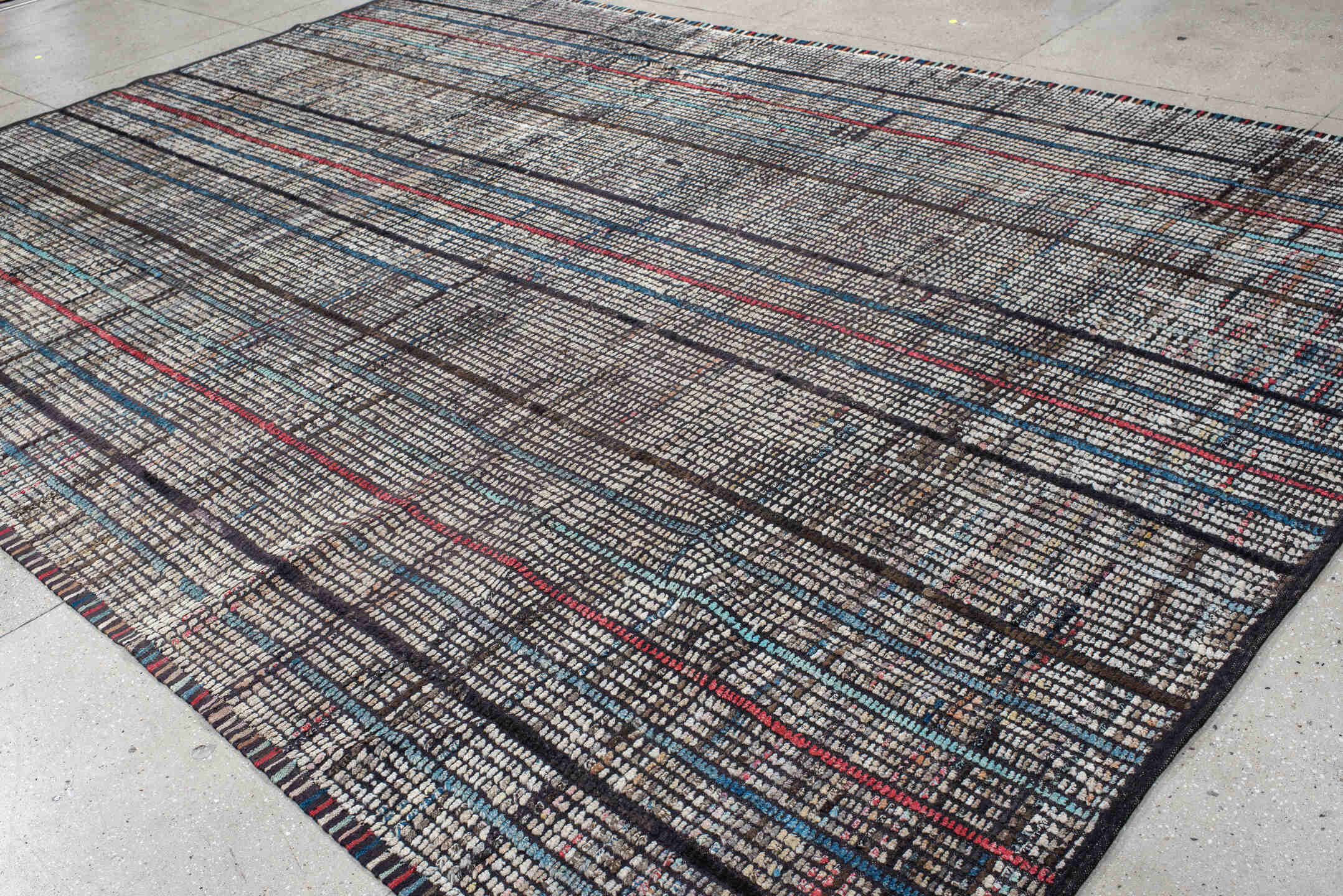 10' x 14' one-of-a-kind handmade vintage Tulu large size rug. Color palette: ivory, charcoal, slate, indigo, crimson, taupe