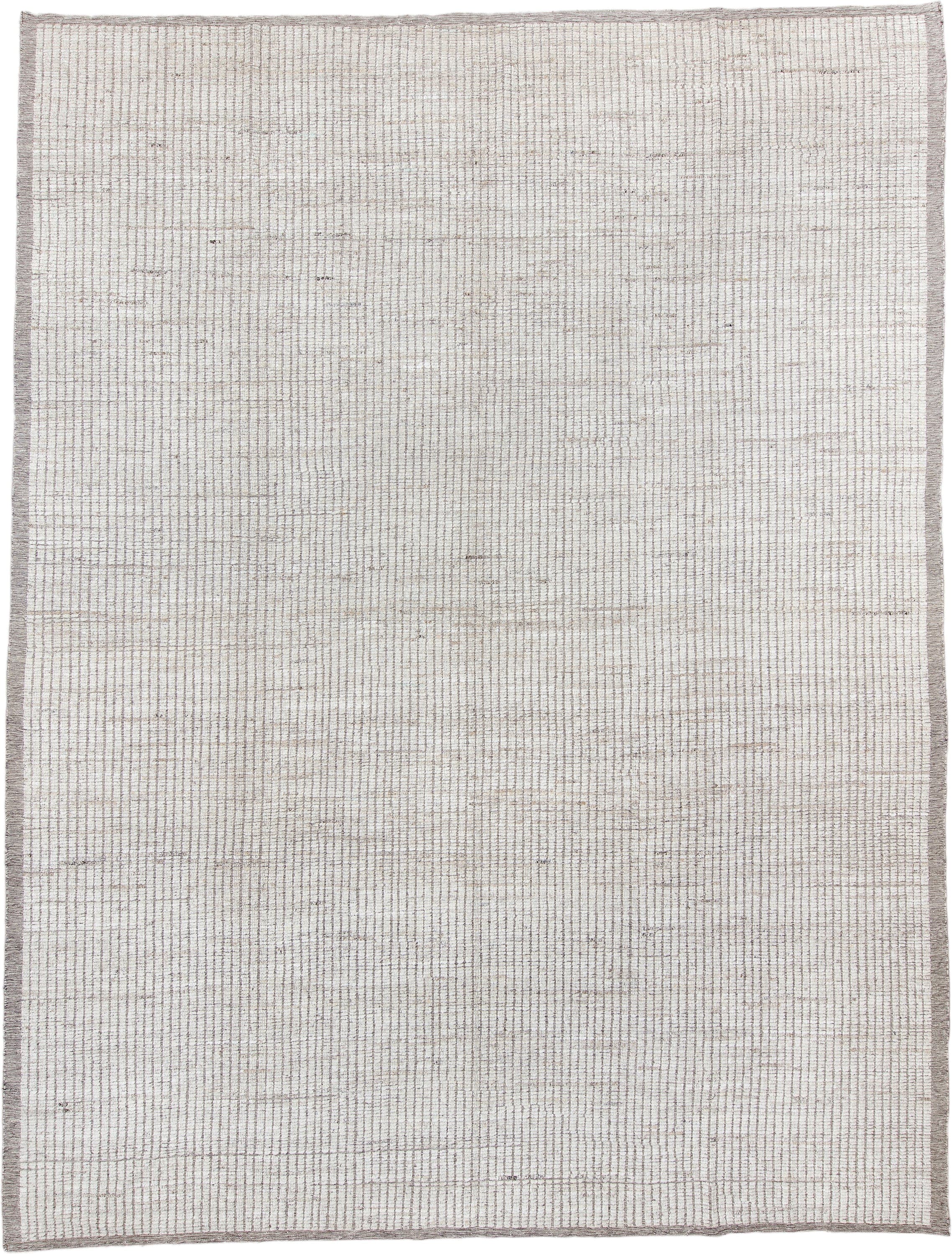 10' x 14' one-of-a-kind handmade vintage Tulu large size rug. Color palette: ivory, taupe, beige, gray