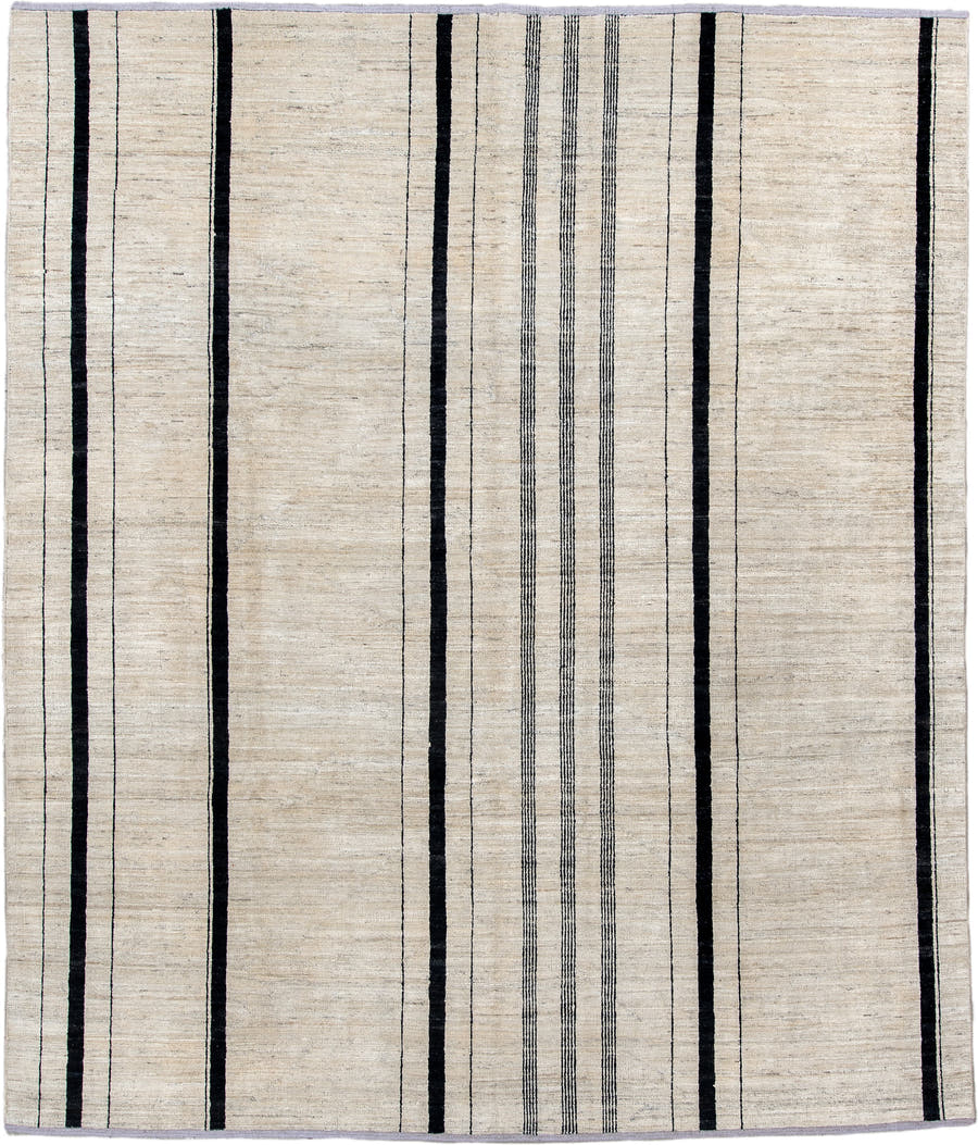 8' x 9' one-of-a-kind handmade vintage Tulu rug. Color palette: ivory, charcoal, ebony, cream, taupe, gray, black, beige