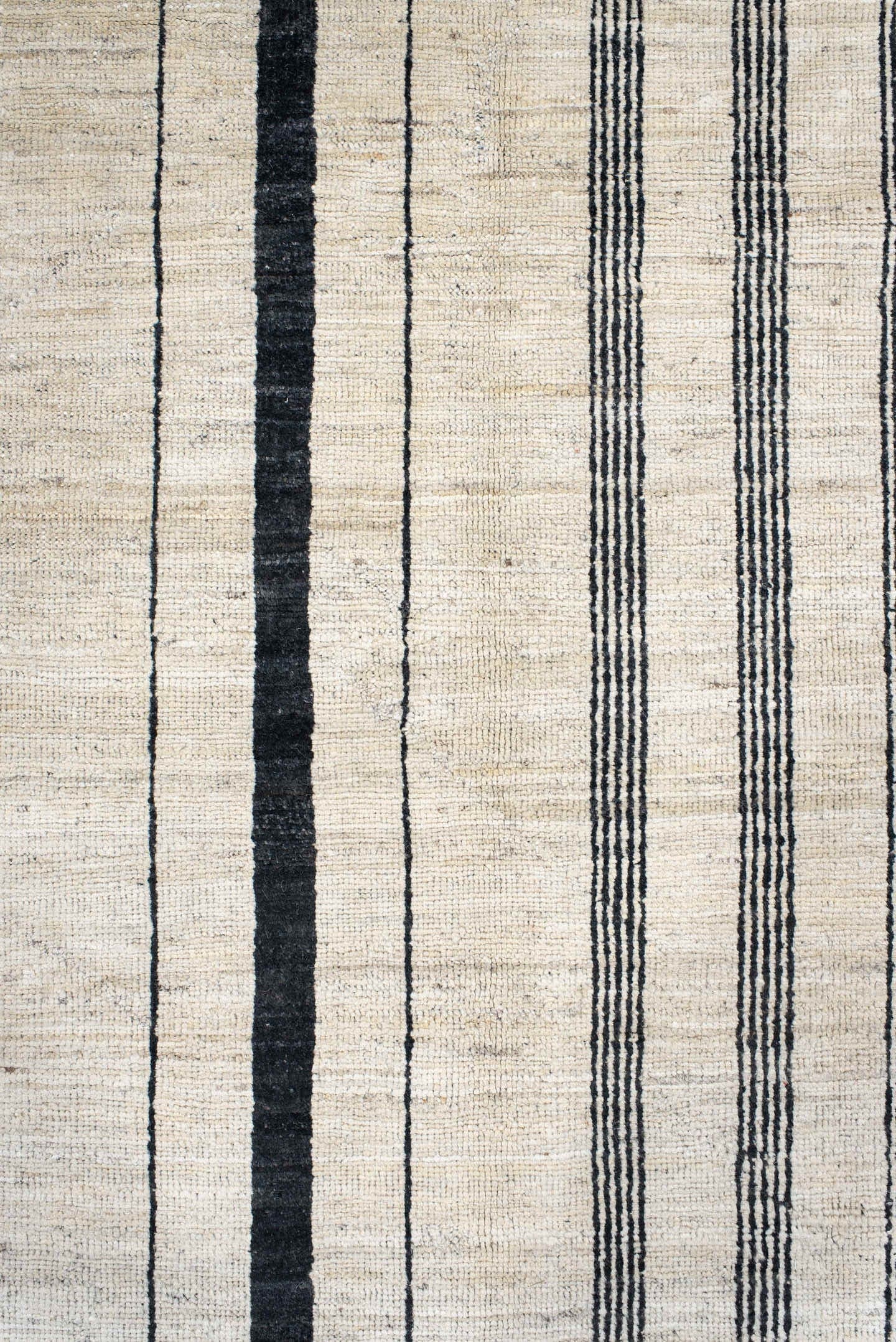 8' x 9' one-of-a-kind handmade vintage Tulu rug. Color palette: ivory, charcoal, ebony, cream, taupe, gray, black, beige