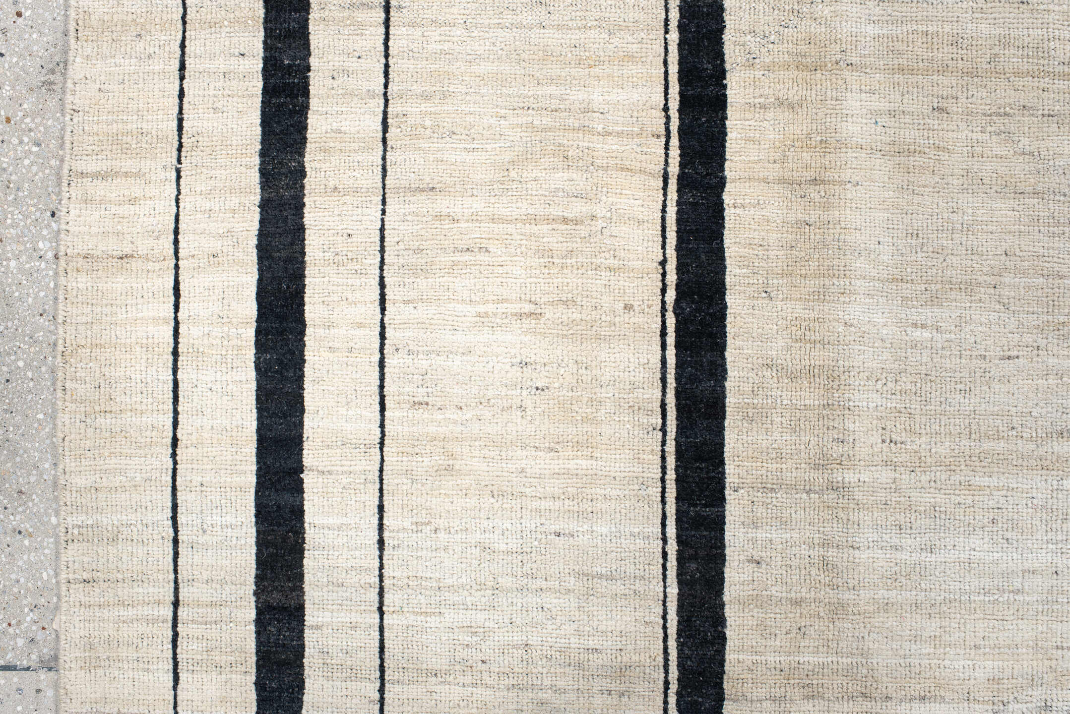 8' x 9' one-of-a-kind handmade vintage Tulu rug. Color palette: ivory, charcoal, ebony, cream, taupe, gray, black, beige