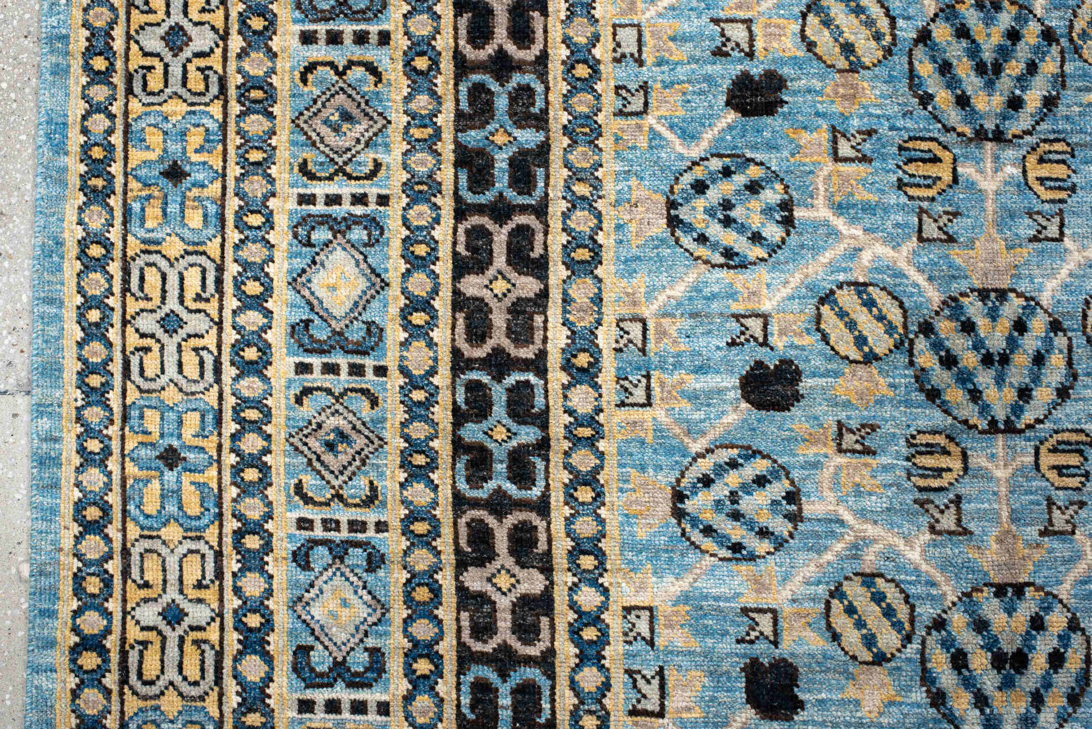 9' x 14' one-of-a-kind handmade vintage Khotan large size rug. Color palette: black, blue, brown, burlywood, charcoal