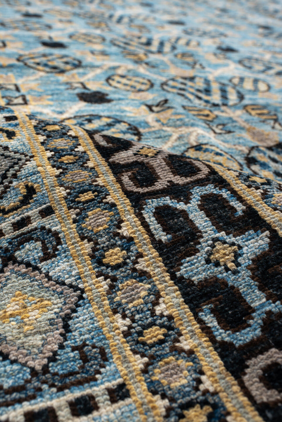 9' x 14' one-of-a-kind handmade vintage Khotan large size rug. Color palette: light blue, ivory, navy, charcoal, beige