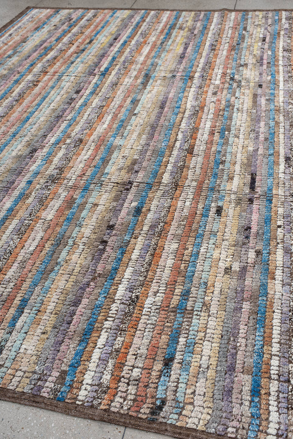 8' x 11' one-of-a-kind handmade vintage Tulu large size rug. Color palette: ivory, taupe, brown, lavender, turquoise, coral