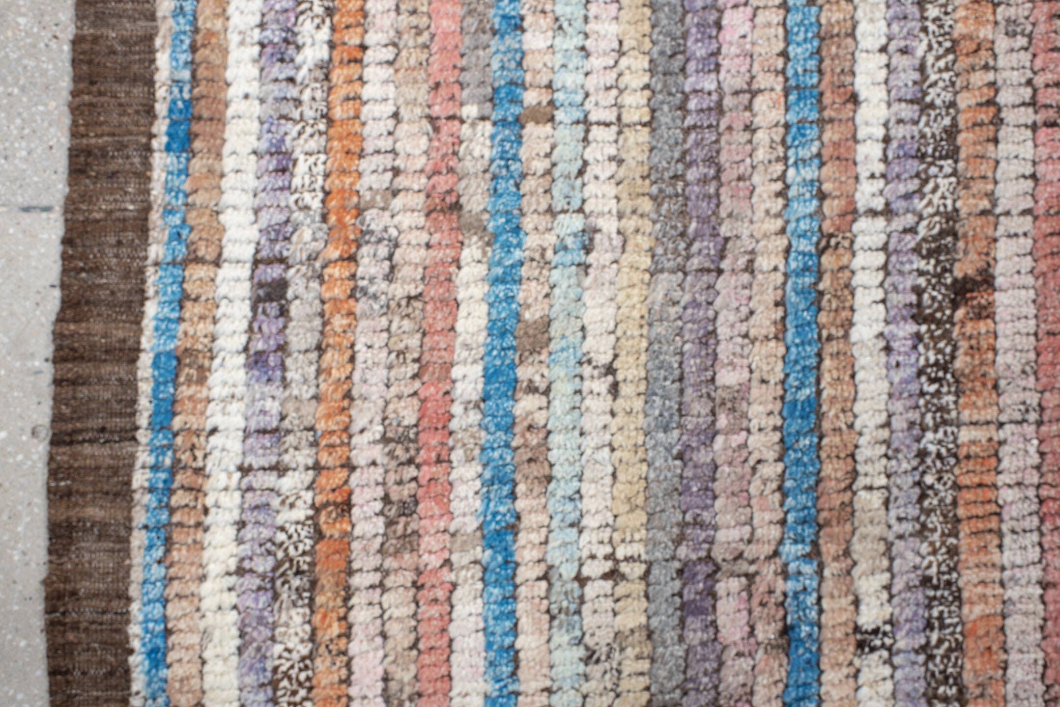 8' x 11' one-of-a-kind handmade vintage Tulu large size rug. Color palette: ivory, taupe, brown, lavender, turquoise, coral