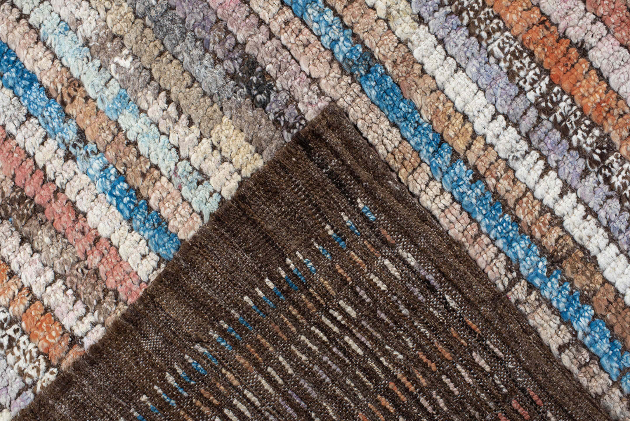 8' x 11' one-of-a-kind handmade vintage Tulu large size rug. Color palette: ivory, taupe, brown, lavender, turquoise, coral