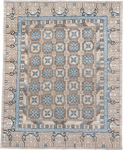 11' x 13' one-of-a-kind handmade vintage Khotan oversize rug. Color palette: ivory, sky_blue, taupe, charcoal, cream