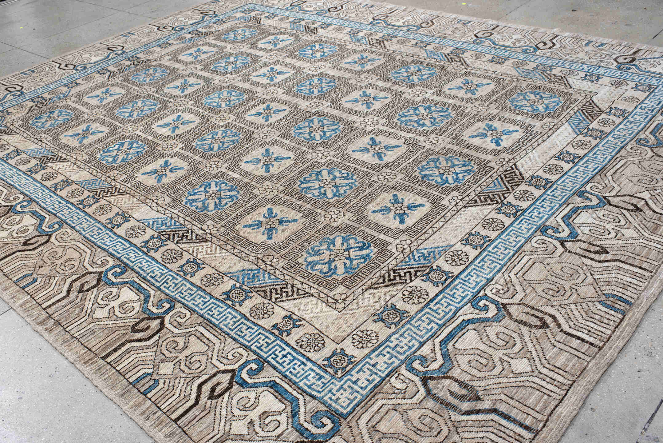 11' x 13' one-of-a-kind handmade vintage Khotan oversize rug. Color palette: antiquewhite, blue, fiord, gray, light blue