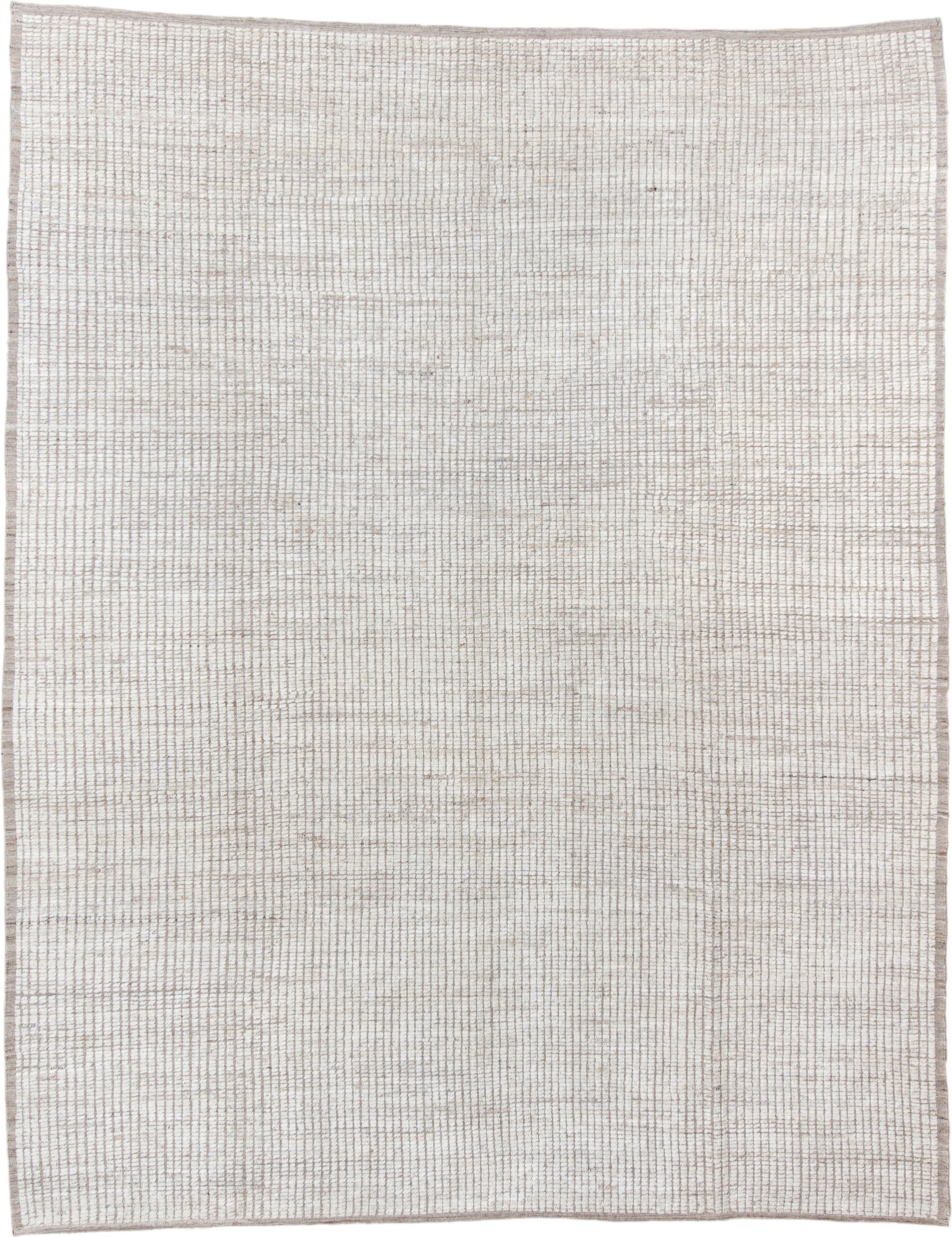 10' x 13' one-of-a-kind handmade vintage Tulu oversize rug. Color palette: ivory, taupe, cream, beige, gray