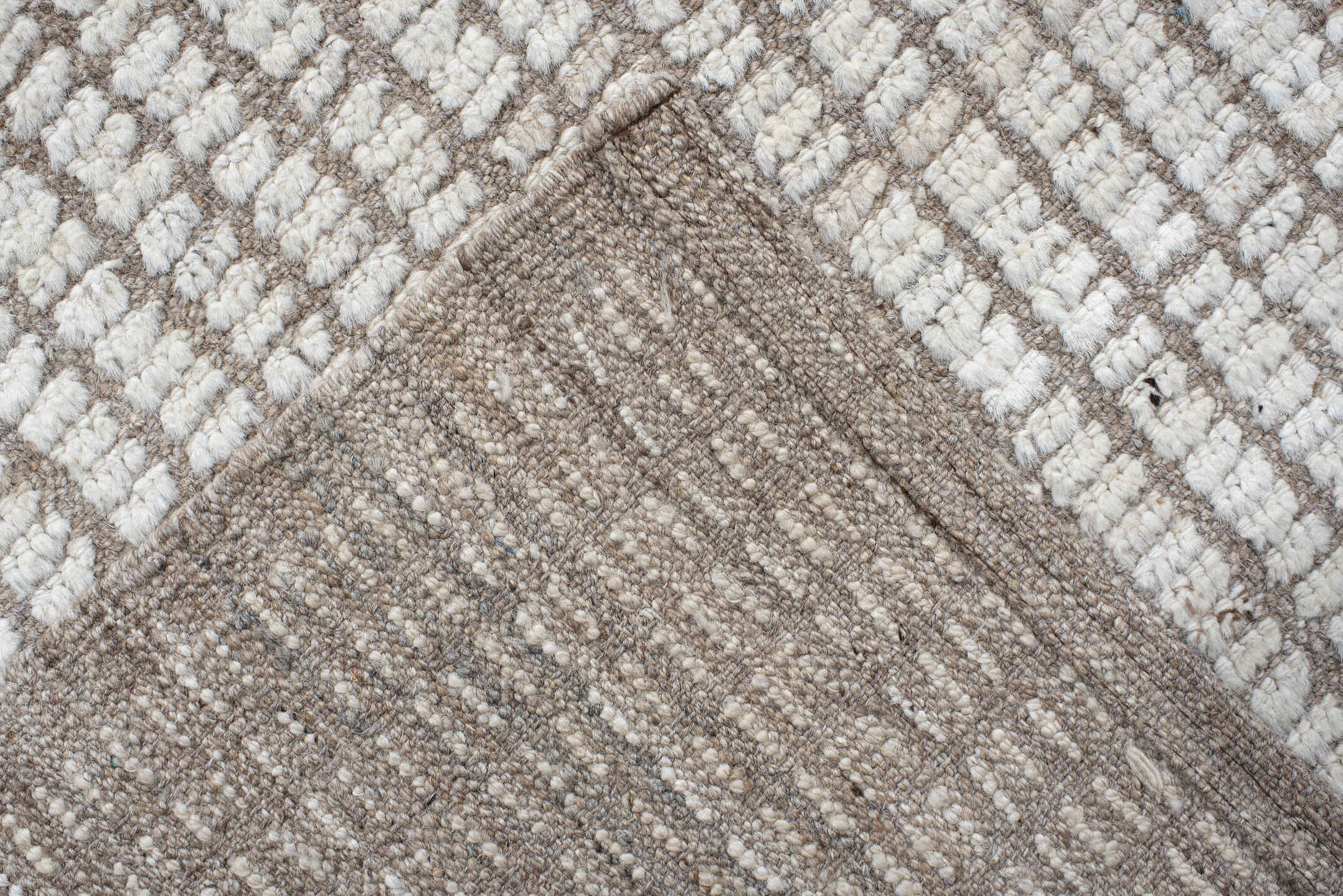 10' x 13' one-of-a-kind handmade vintage Tulu oversize rug. Color palette: ivory, taupe, cream, beige, gray