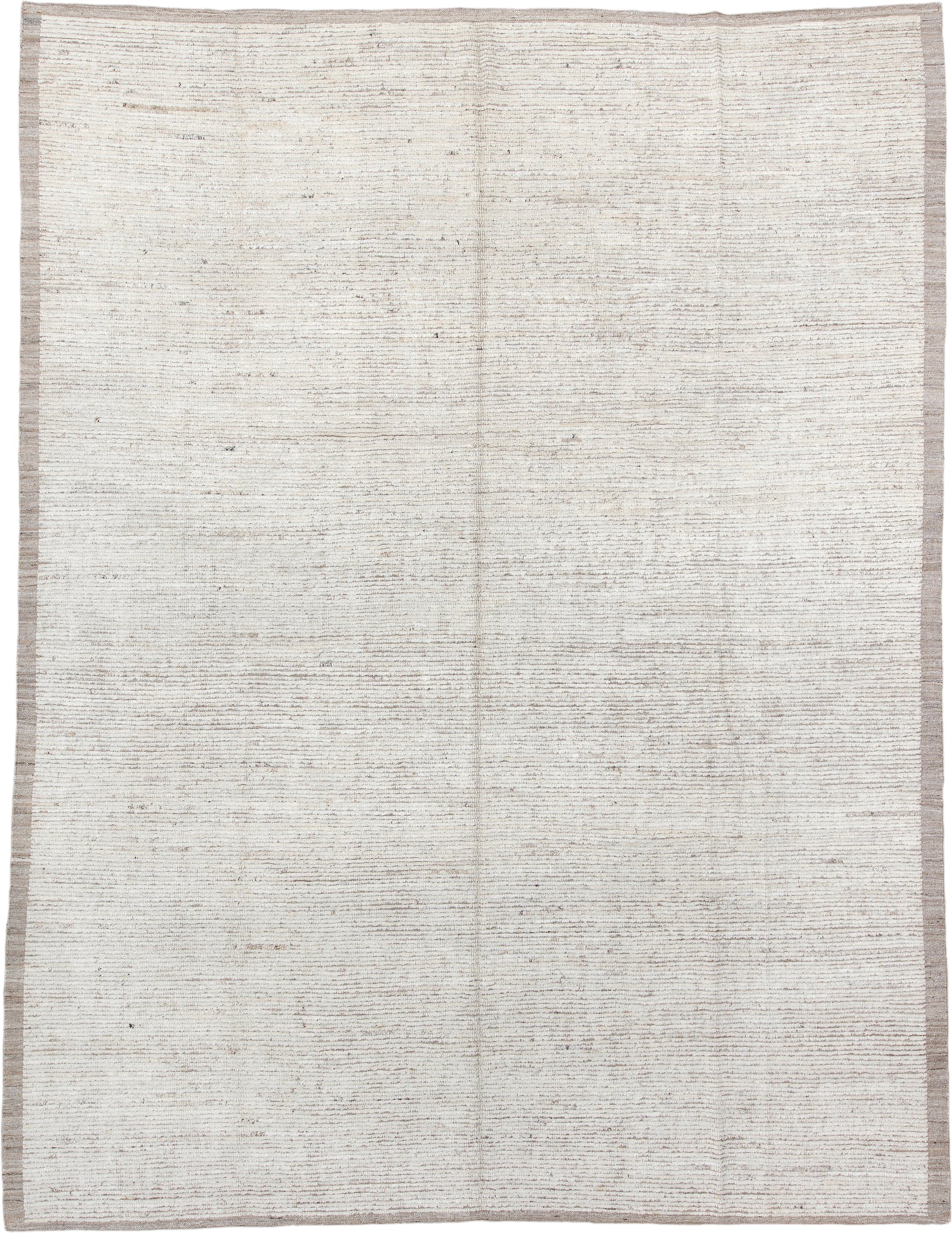 9' x 12' one-of-a-kind handmade vintage Tulu large size rug. Color palette: ivory, taupe, beige, cream, gray