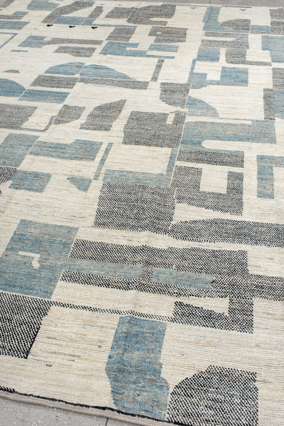 9' x 12' one-of-a-kind handmade vintage Tulu large size rug. Color palette: ivory, sky blue, charcoal, cream, slate
