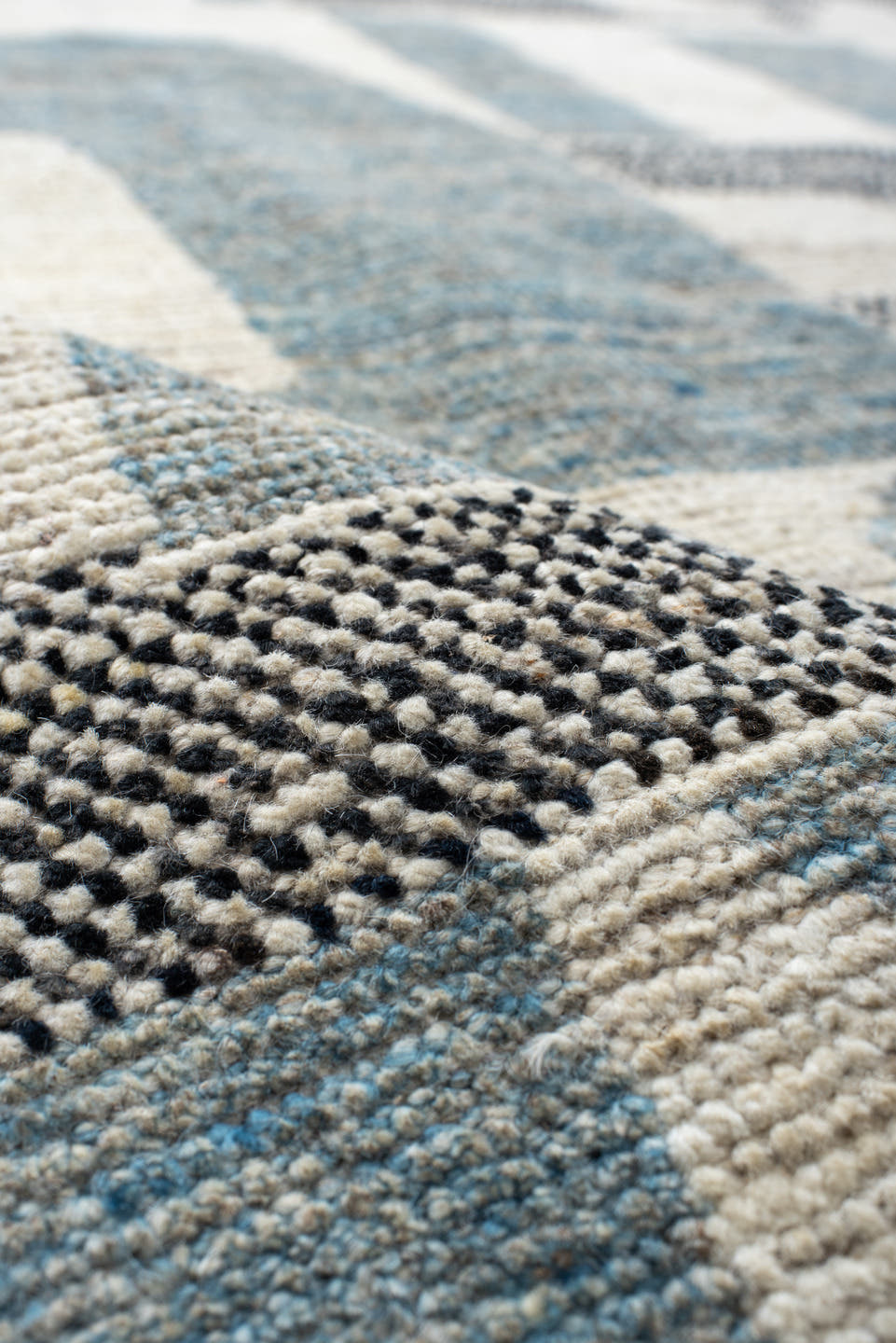 9' x 12' one-of-a-kind handmade vintage Tulu large size rug. Color palette: ivory, sky blue, charcoal, cream, slate