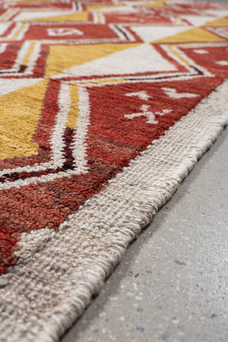 6' x 9' one-of-a-kind handmade vintage Tulu medium size rug. Color palette: rust, ivory, gold, charcoal, saffron, terracotta