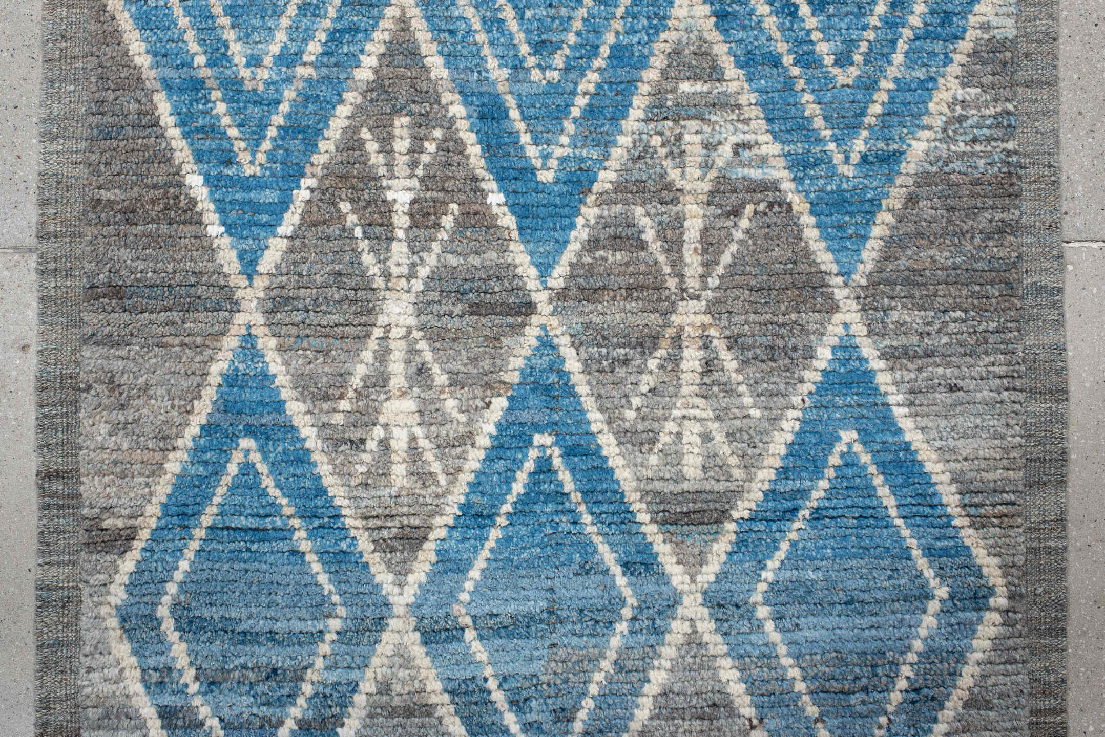 3' x 9' one-of-a-kind handmade vintage Tulu runner rug. Color palette: gray, sky blue, ivory, slate, charcoal, light blue