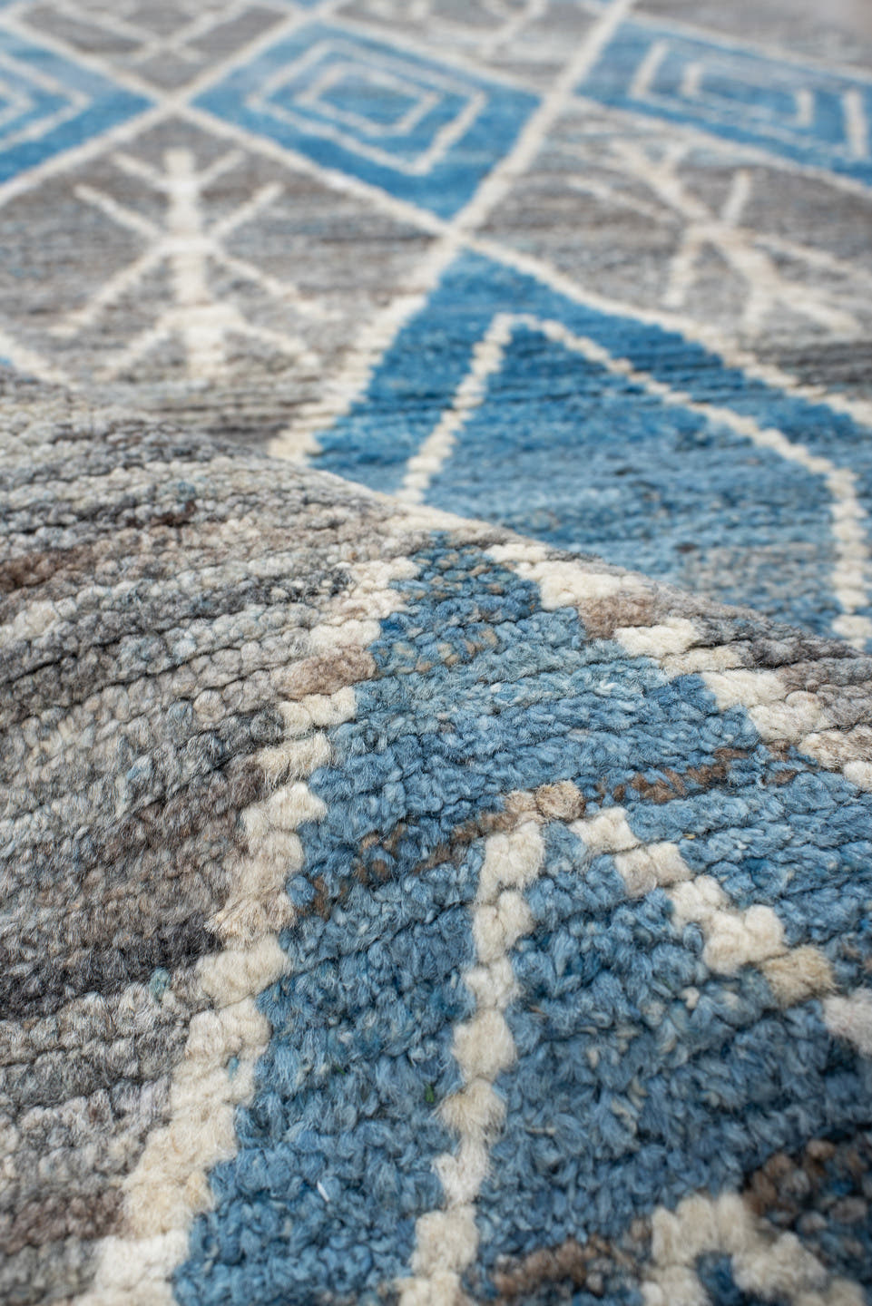 3' x 9' one-of-a-kind handmade vintage Tulu runner rug. Color palette: gray, sky blue, ivory, slate, charcoal, light blue