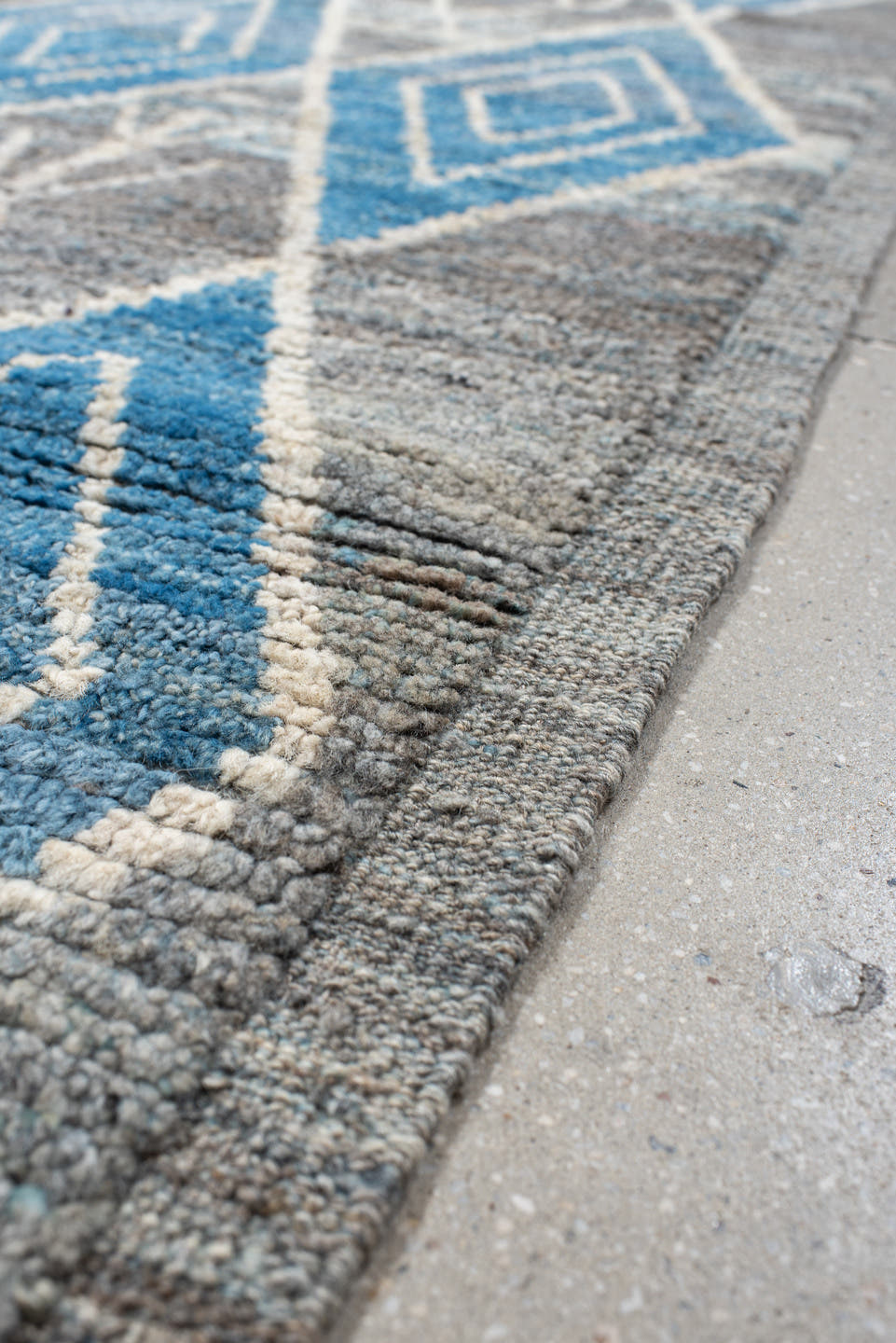 3' x 9' one-of-a-kind handmade vintage Tulu runner rug. Color palette: gray, sky blue, ivory, slate, charcoal, light blue
