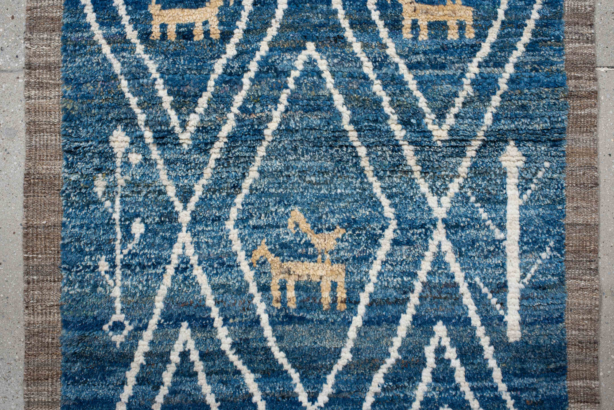 2' x 10' one-of-a-kind handmade vintage Tulu runner rug. Color palette: arapawa, blue, brown, gainsboro, gray, light blue