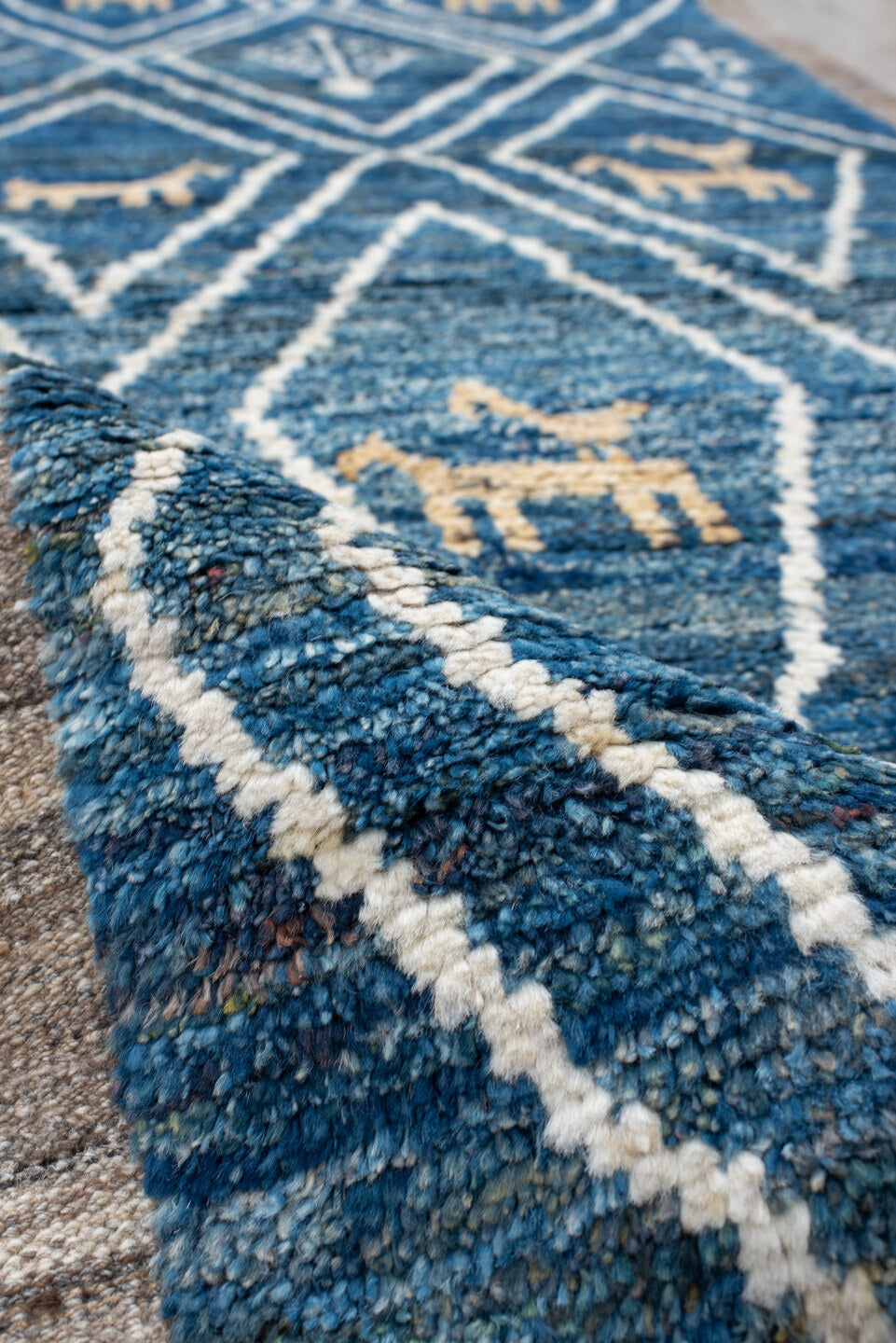 2' x 10' one-of-a-kind handmade vintage Tulu runner rug. Color palette: arapawa, blue, brown, gainsboro, gray, light blue