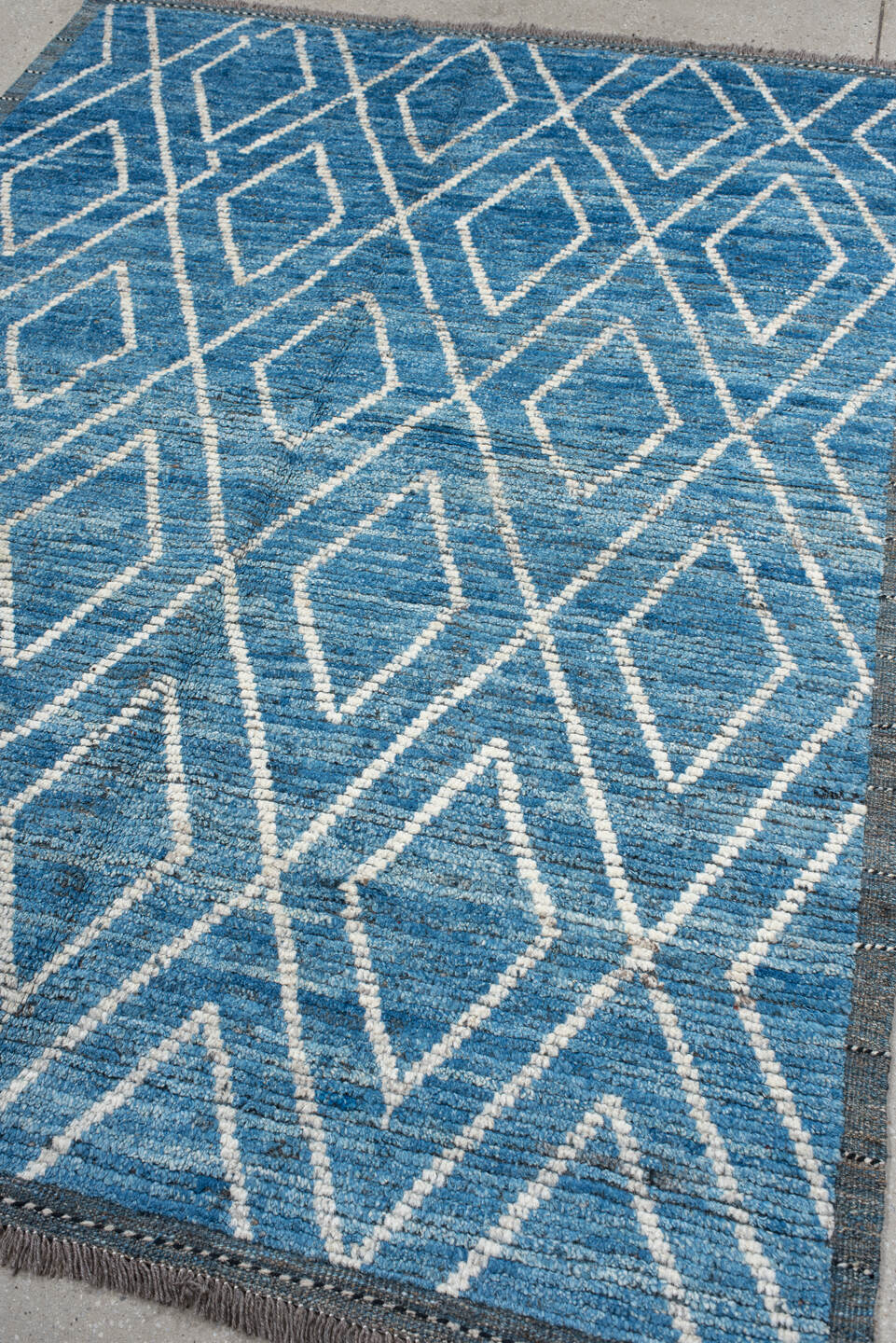 5' x 6' one-of-a-kind handmade vintage Tulu rug. Color palette: blue, ivory, slate, charcoal, gray, black
