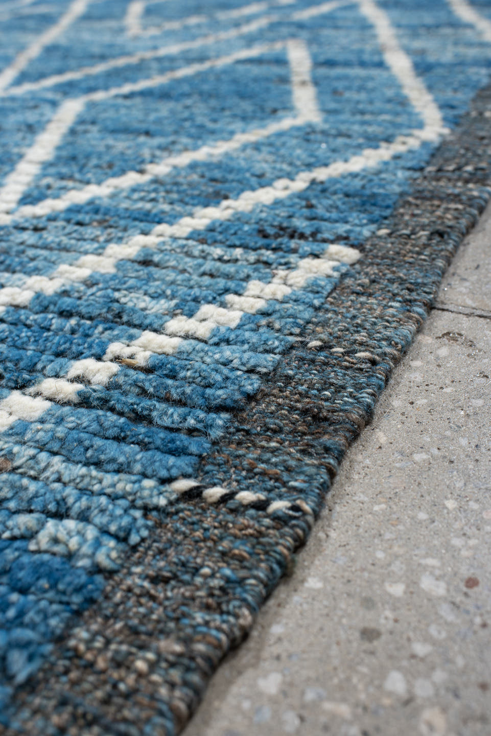 5' x 6' one-of-a-kind handmade vintage Tulu rug. Color palette: blue, ivory, slate, charcoal, gray, black