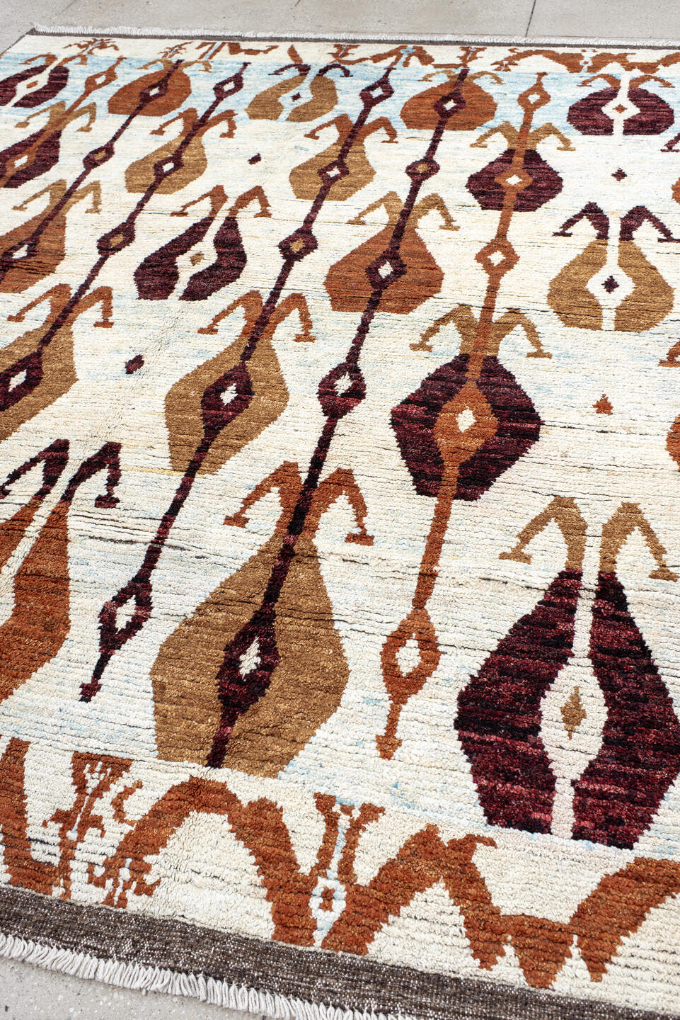 8' x 10' one-of-a-kind handmade vintage Tulu large size rug. Color palette: ivory, camel, rust, burgundy, sky_blue, taupe