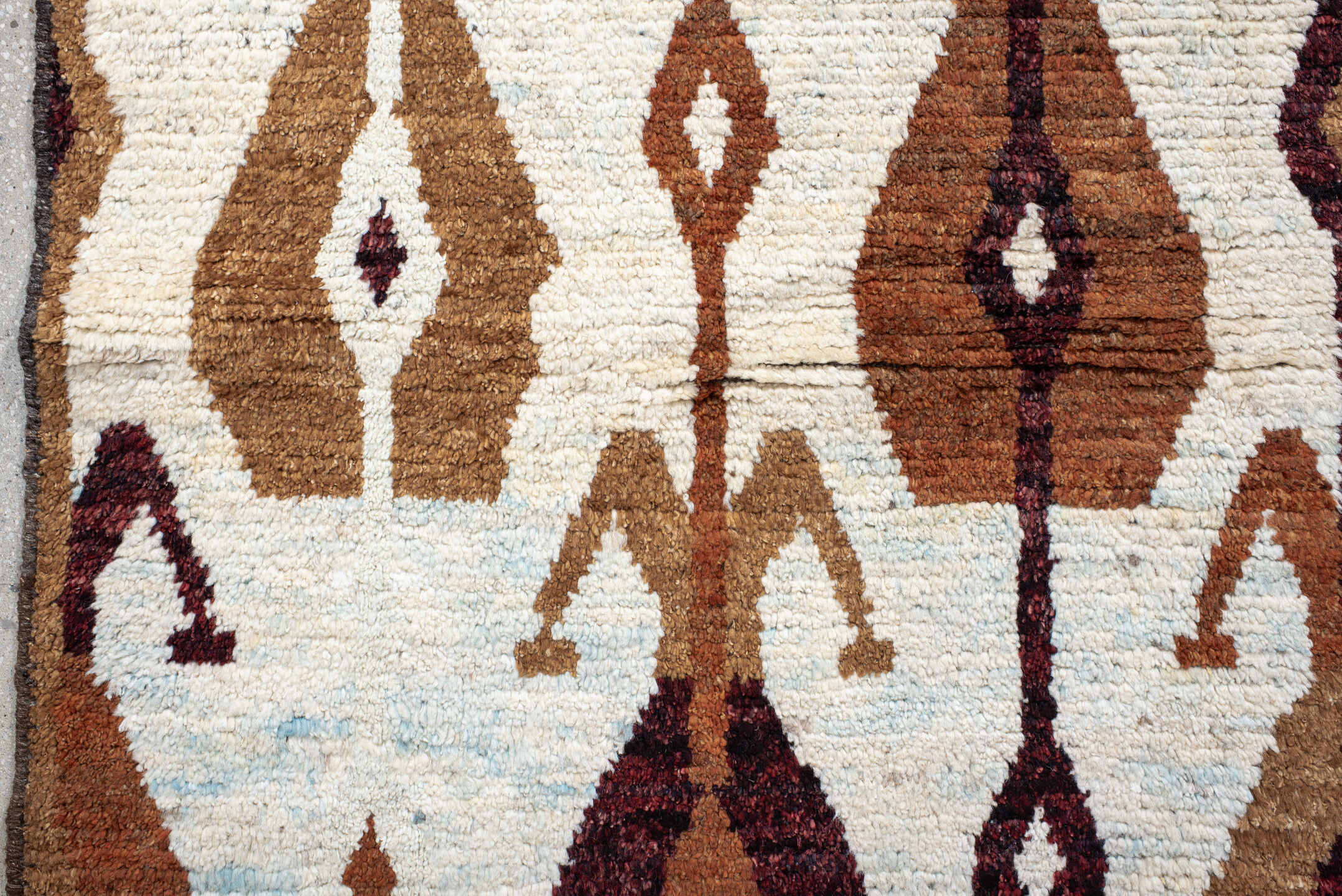 8' x 10' one-of-a-kind handmade vintage Tulu large size rug. Color palette: ivory, camel, rust, burgundy, sky_blue, taupe