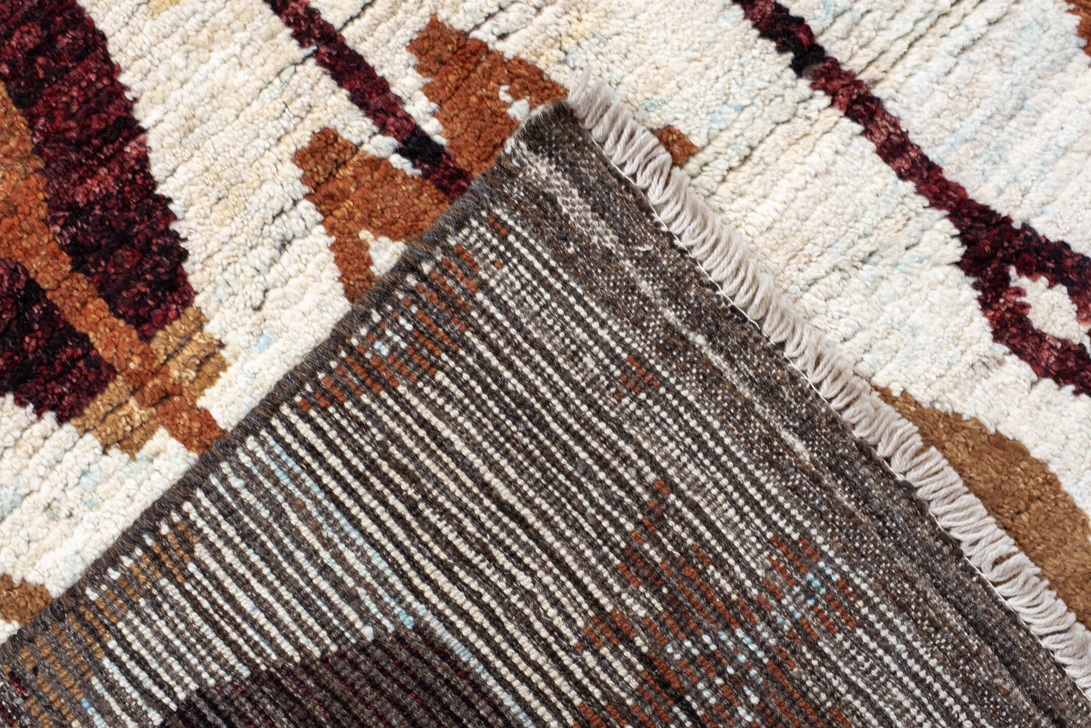 8' x 10' one-of-a-kind handmade vintage Tulu large size rug. Color palette: ivory, camel, rust, burgundy, sky_blue, taupe