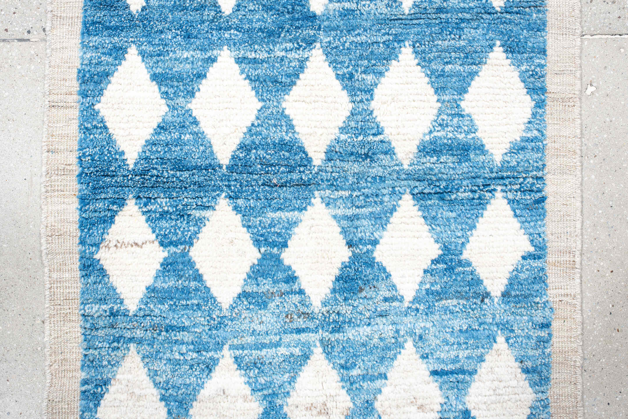 2' x 10' one-of-a-kind handmade vintage Tulu runner rug. Color palette: blue, ivory, cream