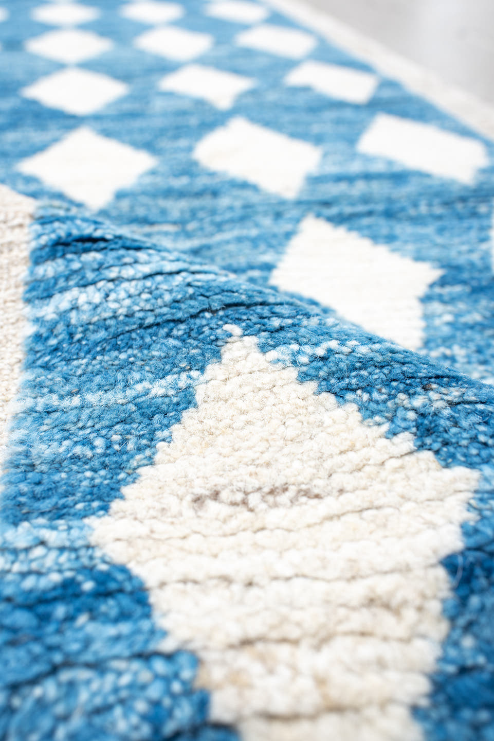 2' x 10' one-of-a-kind handmade vintage Tulu runner rug. Color palette: blue, ivory, cream