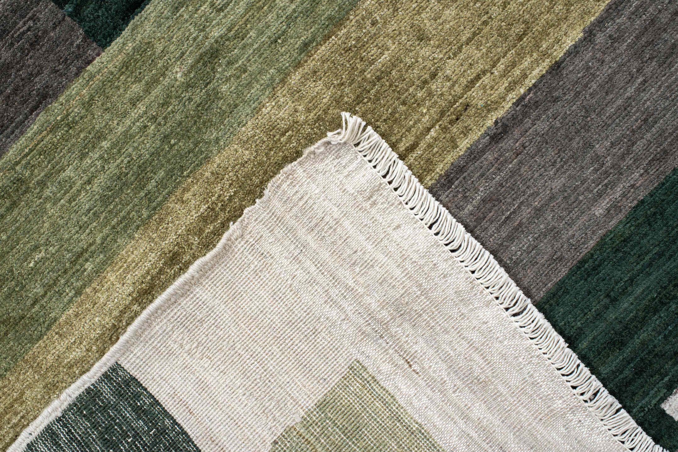 6' x 8' one-of-a-kind handmade handmade Contemporary medium size rug. Color palette: ivory, olive, sage, charcoal