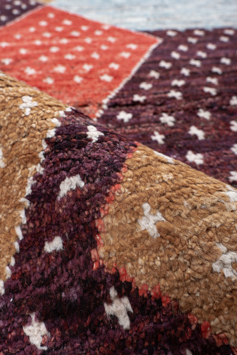6' x 9' one-of-a-kind handmade vintage Tulu large size rug. Color palette: light blue, camel, plum, rust, ivory, charcoal