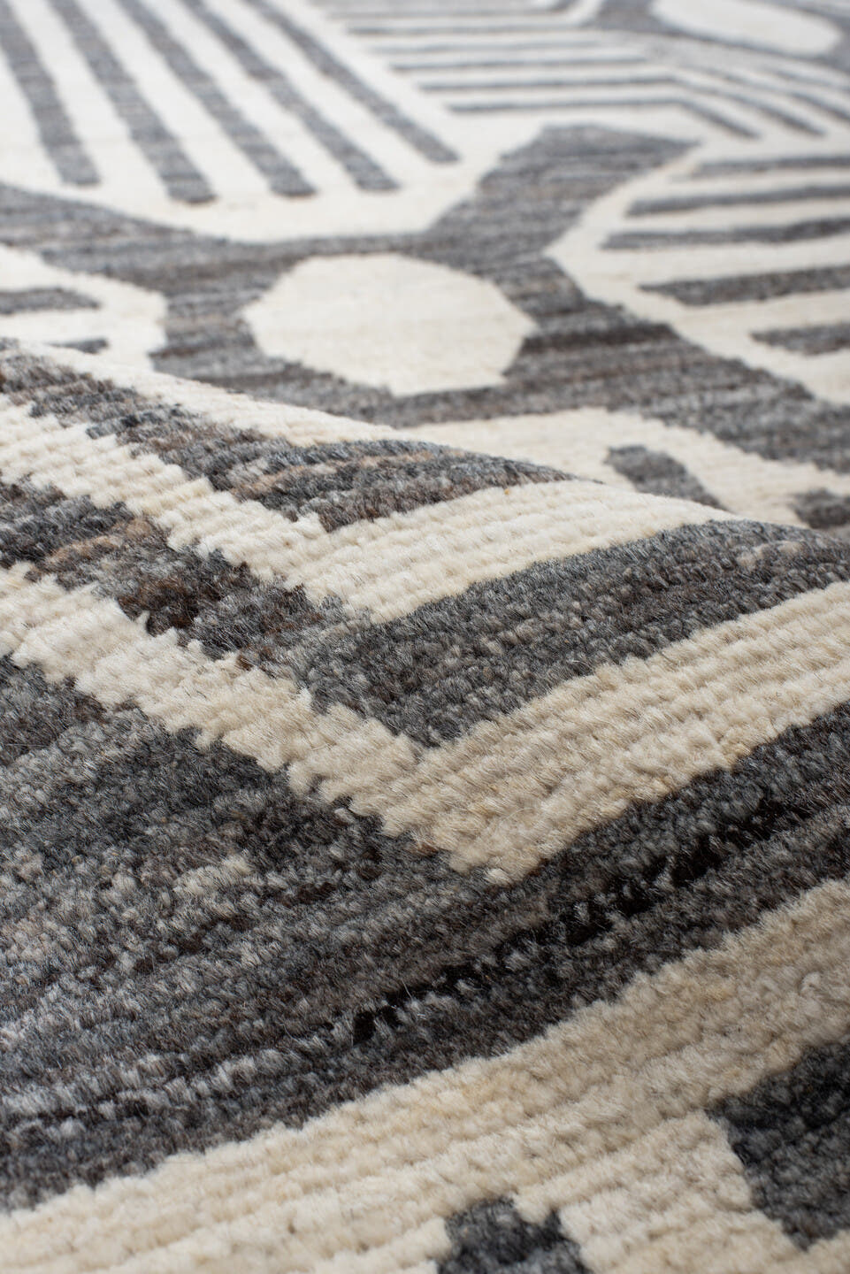 6' x 9' one-of-a-kind handmade vintage Tulu large size rug. Color palette: ivory, charcoal, cream, gray, black