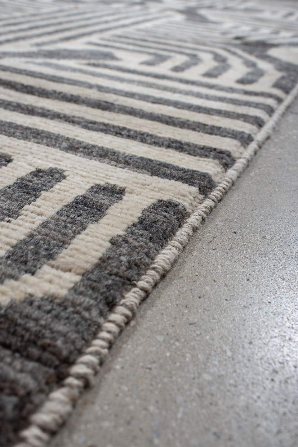 6' x 9' one-of-a-kind handmade vintage Tulu large size rug. Color palette: ivory, charcoal, cream, gray, black
