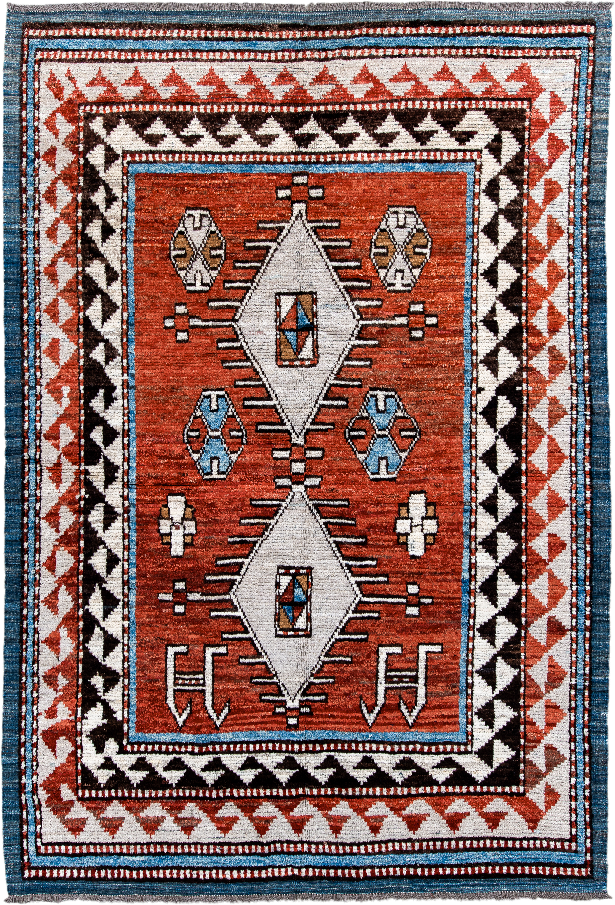 6' x 9' one-of-a-kind handmade vintage Tulu medium size rug. Color palette: rust, ivory, black, blue, brown, terracotta