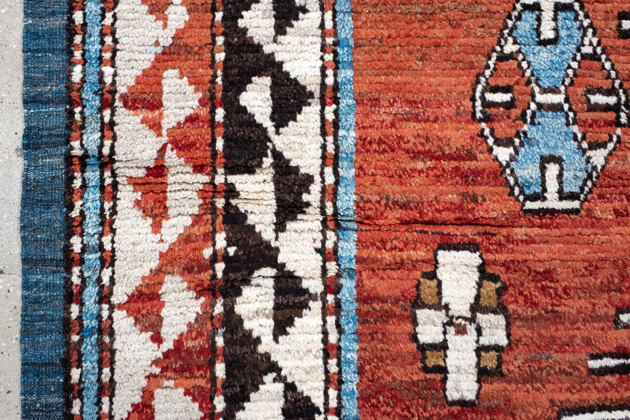 6' x 9' one-of-a-kind handmade vintage Tulu medium size rug. Color palette: rust, ivory, black, blue, brown, terracotta