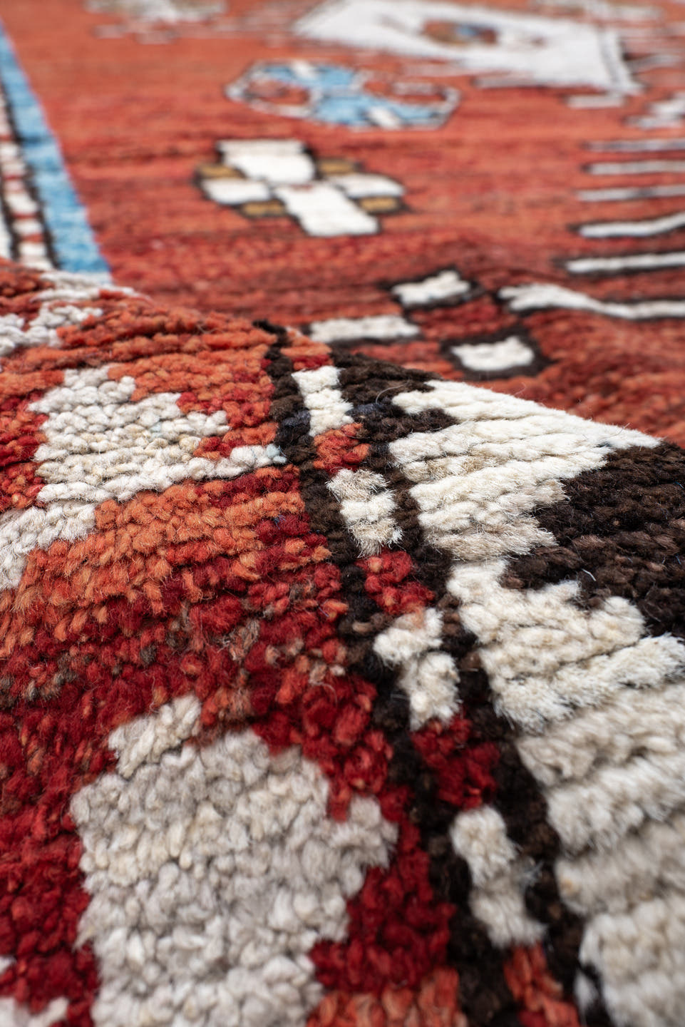 6' x 9' one-of-a-kind handmade vintage Tulu medium size rug. Color palette: rust, ivory, black, blue, brown, terracotta