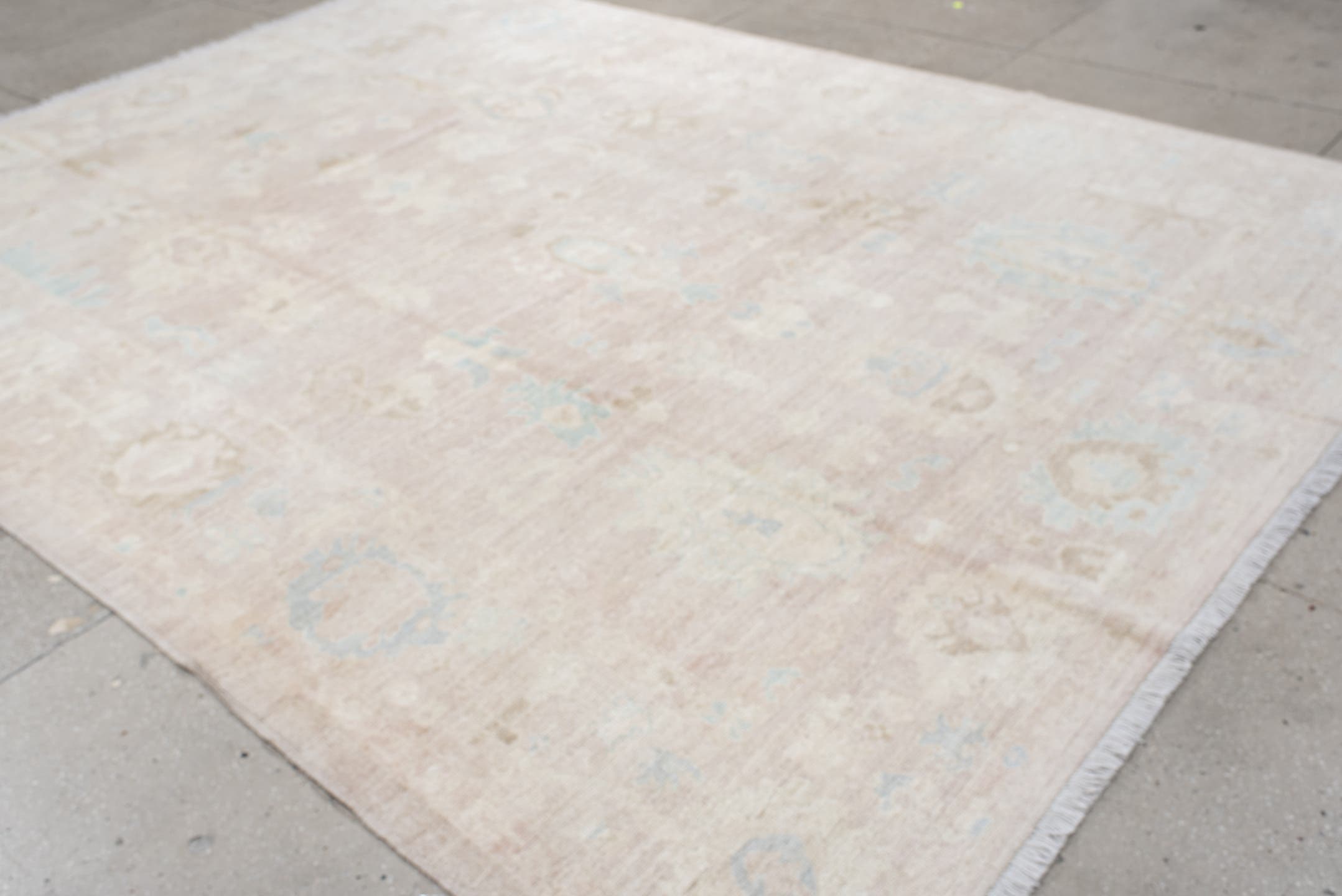 8' x 12' one-of-a-kind handmade vintage Oushak large size rug. Color palette: ivory, cream, blush, pale blue, beige, sand