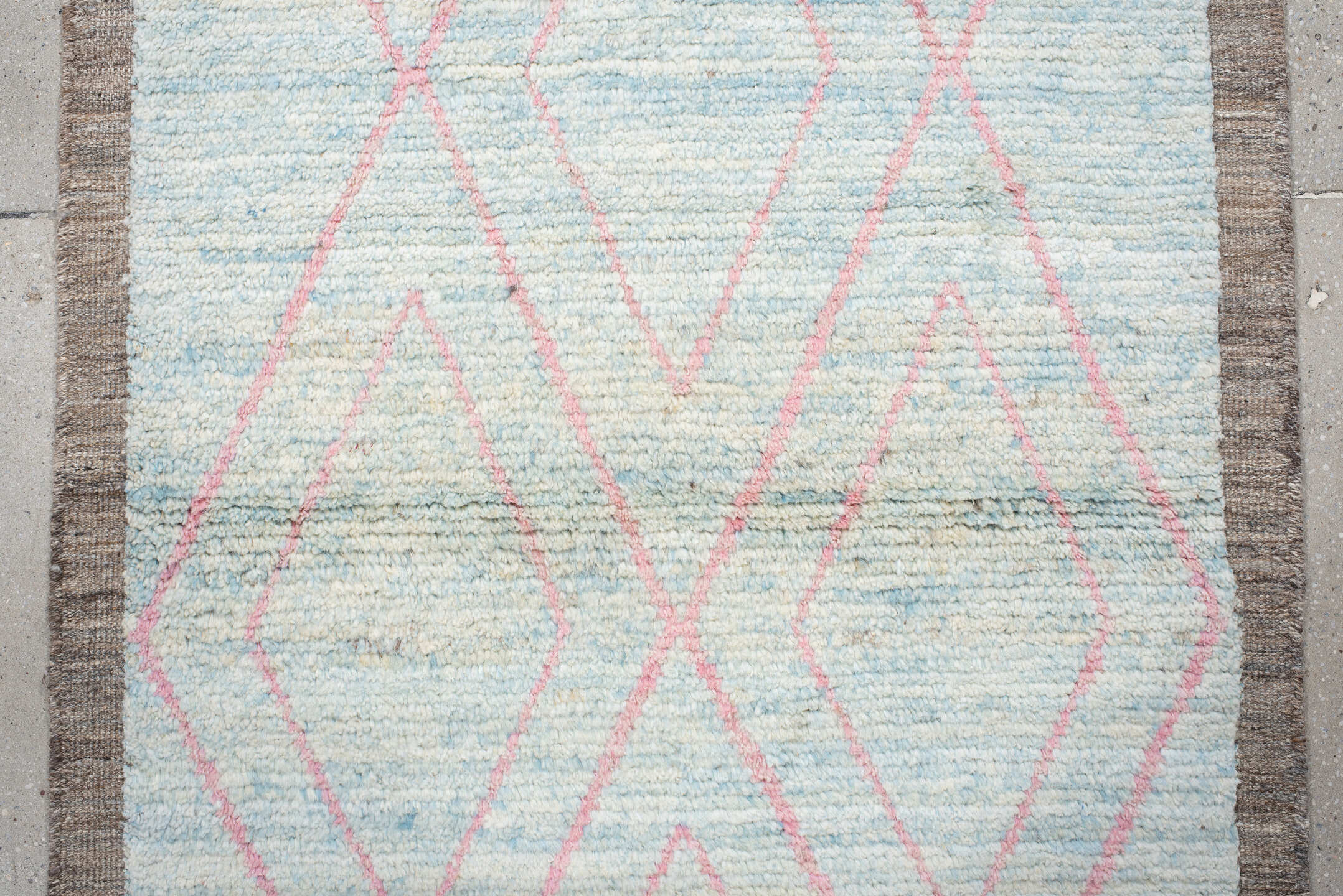 3' x 9' one-of-a-kind handmade vintage Tulu runner rug. Color palette: gray, pink, light gray, off-white, light blue