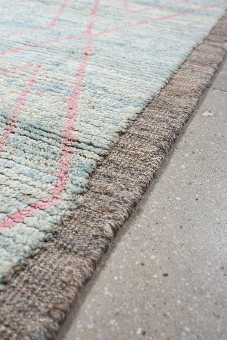3' x 9' one-of-a-kind handmade vintage Tulu runner rug. Color palette: ivory, pale blue, taupe, blush, charcoal, light blue