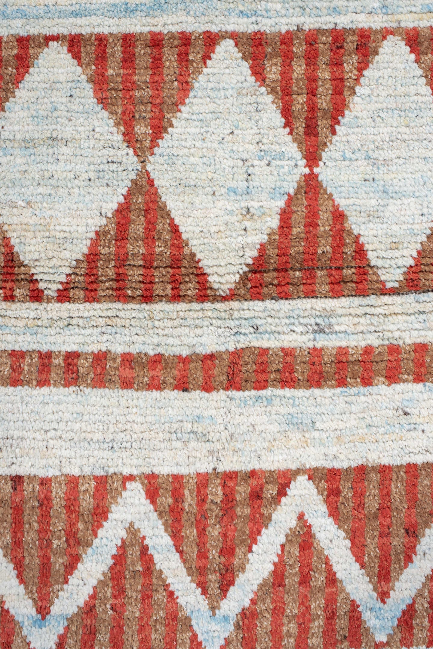 3' x 16' one-of-a-kind handmade vintage Tulu runner rug. Color palette: rust, ivory, sky blue, charcoal, terracotta, brown