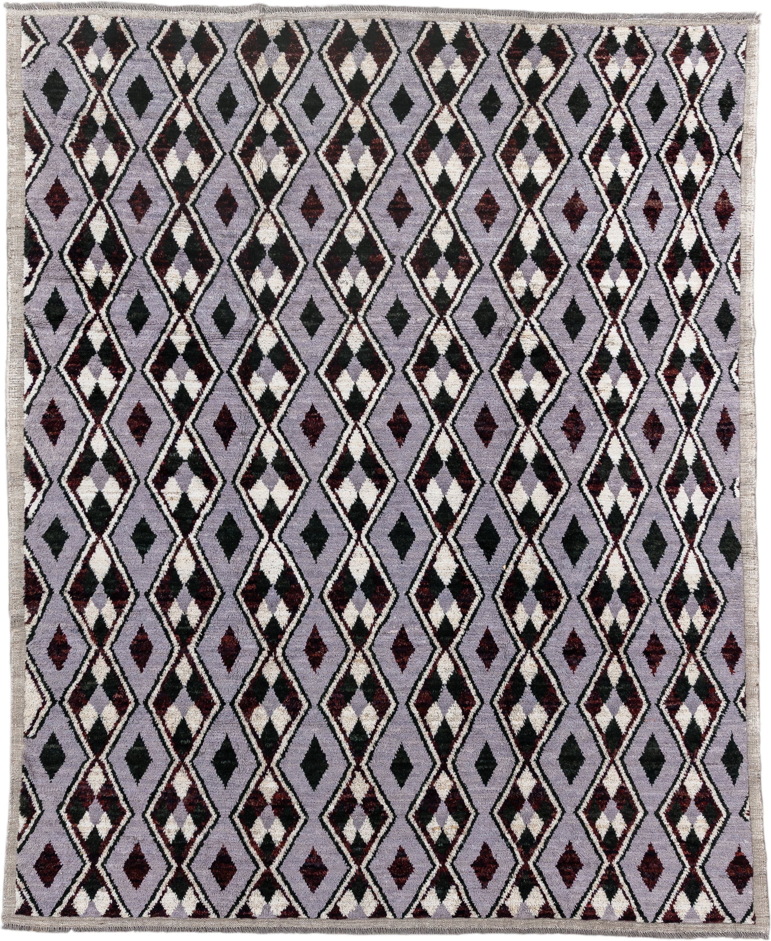 7' x 9' one-of-a-kind handmade vintage Tulu rug. Color palette: lavender, charcoal, ivory, burgundy, light gray, gray, black