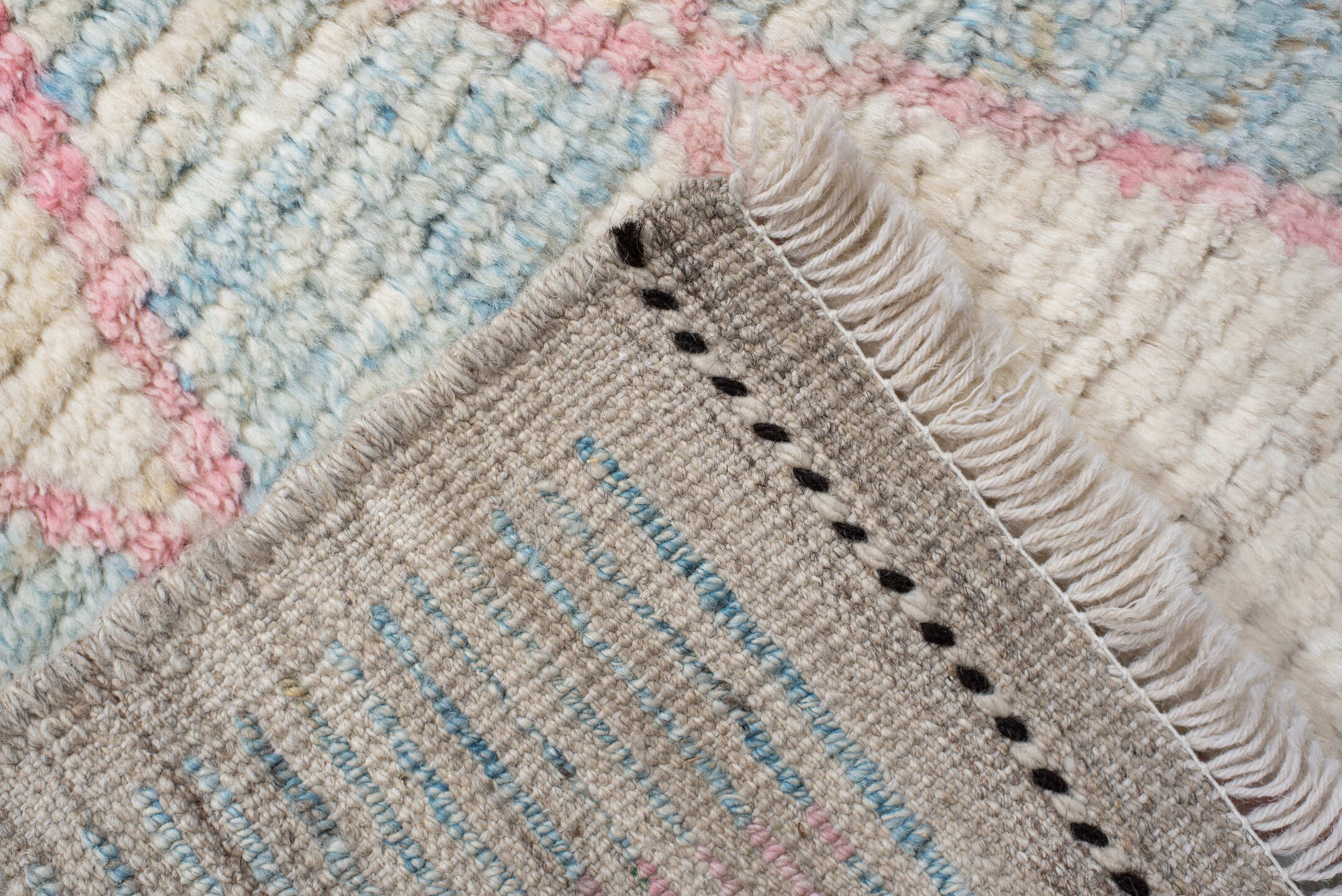 3' x 9' one-of-a-kind handmade vintage Tulu runner rug. Color palette: ivory, sky blue, pink, taupe, light blue, beige, gray